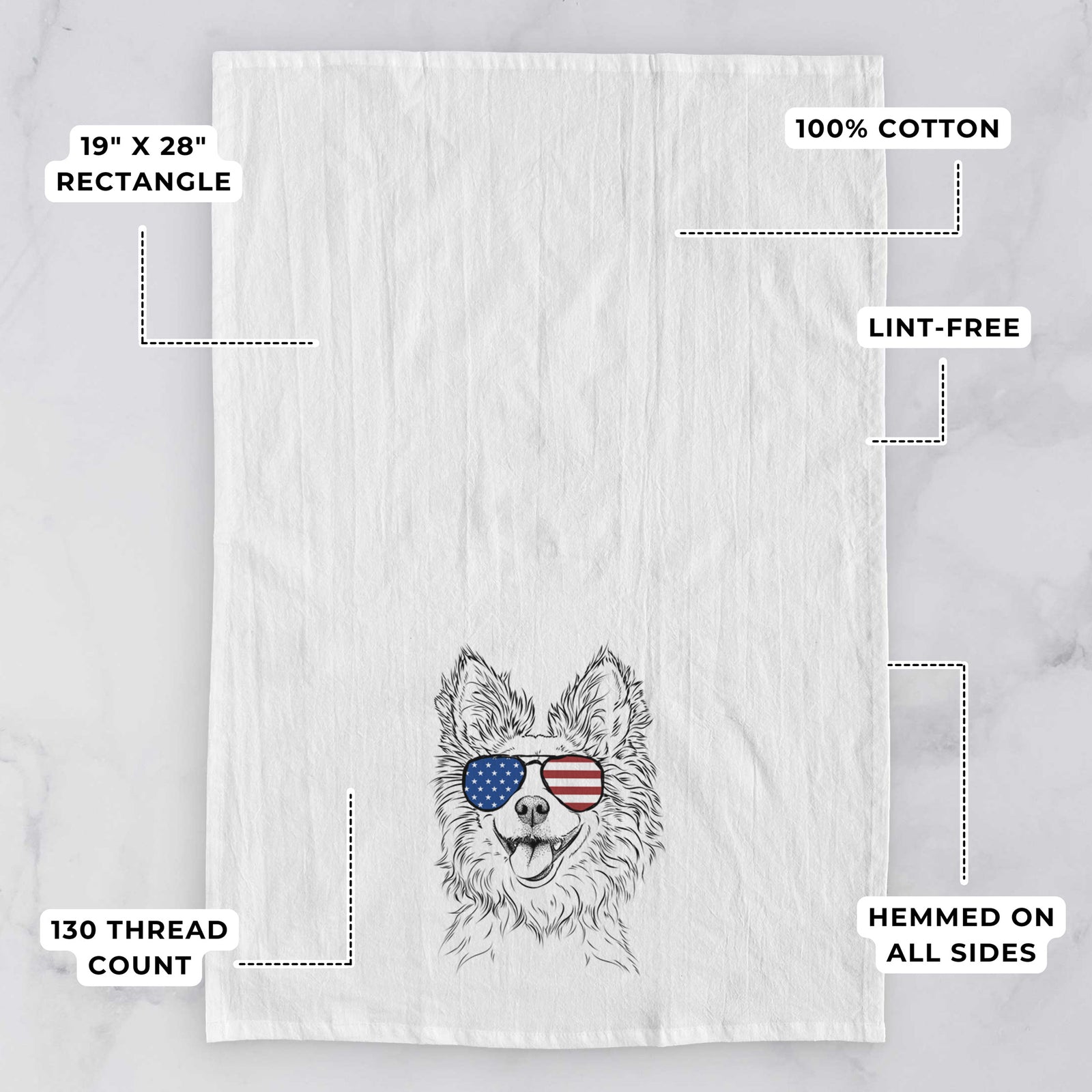Hand-drawn sketch of Jasper the Pomchi wearing American flag sunglasses on a tea towel, with feature callouts: 19 x 28 inch rectangle, 100% cotton, lint-free, 120 thread count, hemmed on all sides