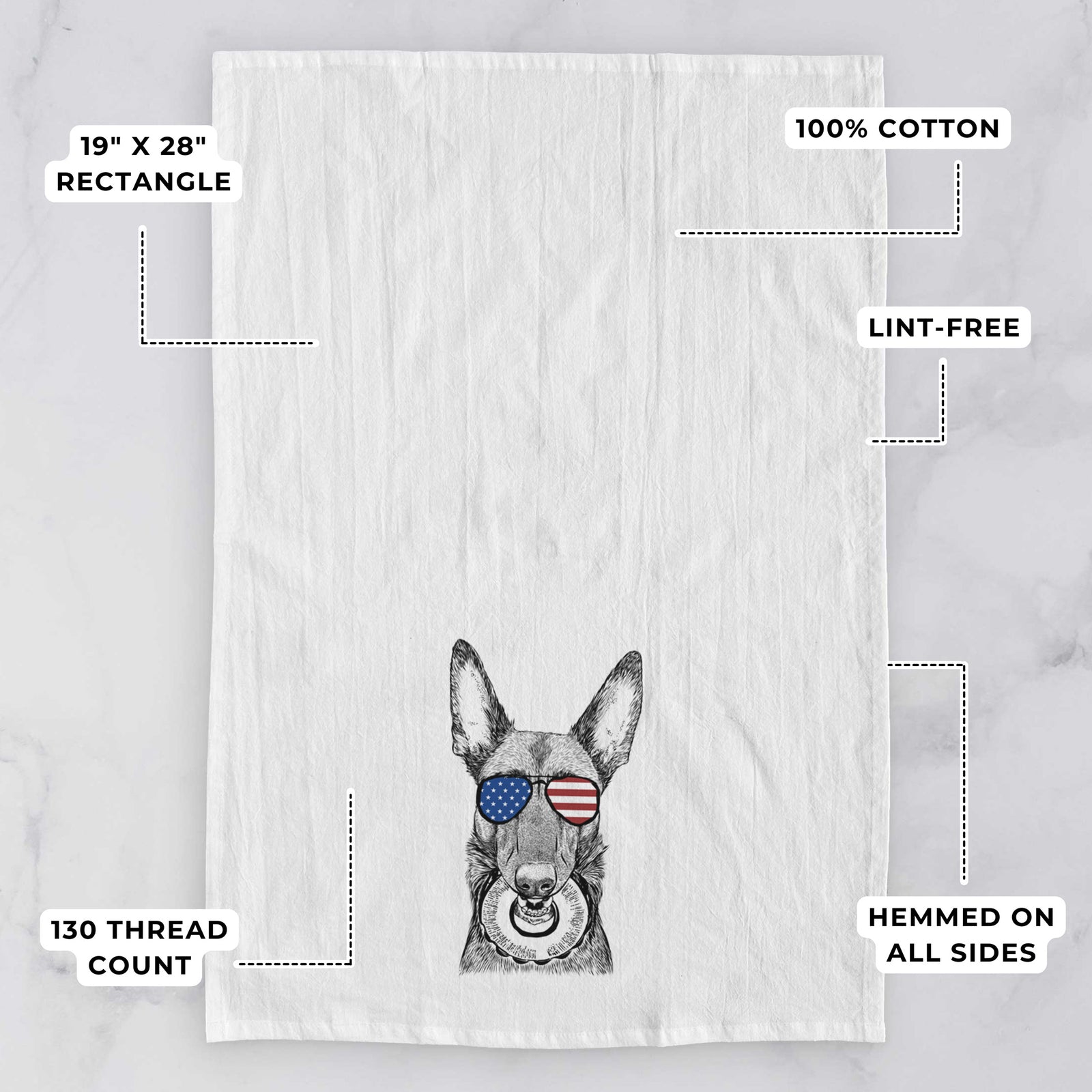 Hand-drawn sketch of Juno the Belgian Malinois wearing American flag sunglasses on a tea towel, with feature callouts: 19 x 28 inch rectangle, 100% cotton, lint-free, 120 thread count, hemmed on all sides