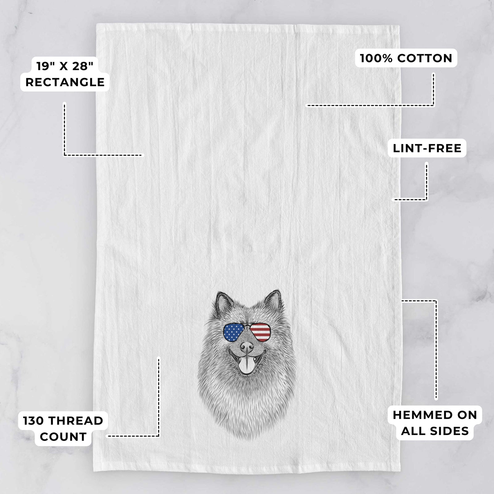 Hand-drawn sketch of Kai the Keeshond wearing American flag sunglasses on a tea towel, with feature callouts: 19 x 28 inch rectangle, 100% cotton, lint-free, 120 thread count, hemmed on all sides
