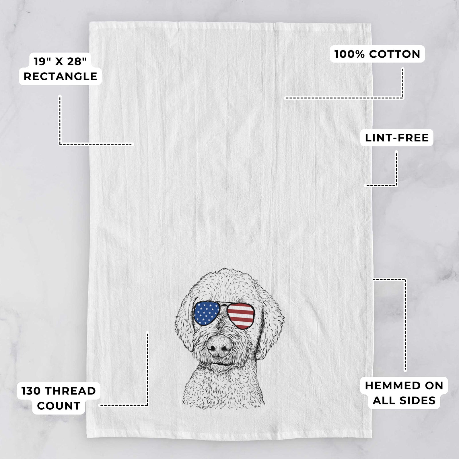 Hand-drawn sketch of Lucy Boo the Goldendoodle wearing American flag sunglasses on a tea towel, with feature callouts: 19 x 28 inch rectangle, 100% cotton, lint-free, 120 thread count, hemmed on all sides