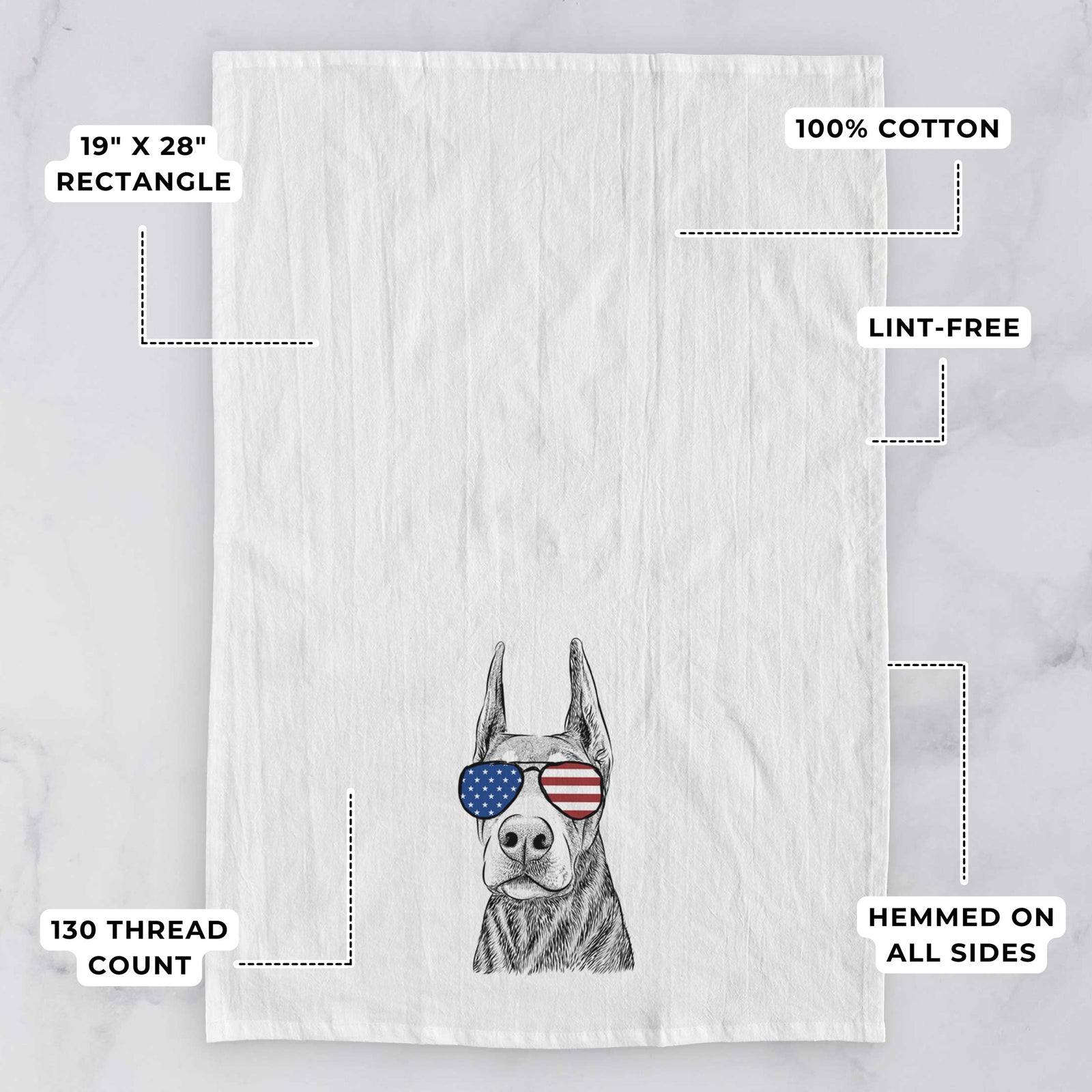 Hand-drawn sketch of Luna the Doberman Pinscher wearing American flag sunglasses on a tea towel, with feature callouts: 19 x 28 inch rectangle, 100% cotton, lint-free, 120 thread count, hemmed on all sides