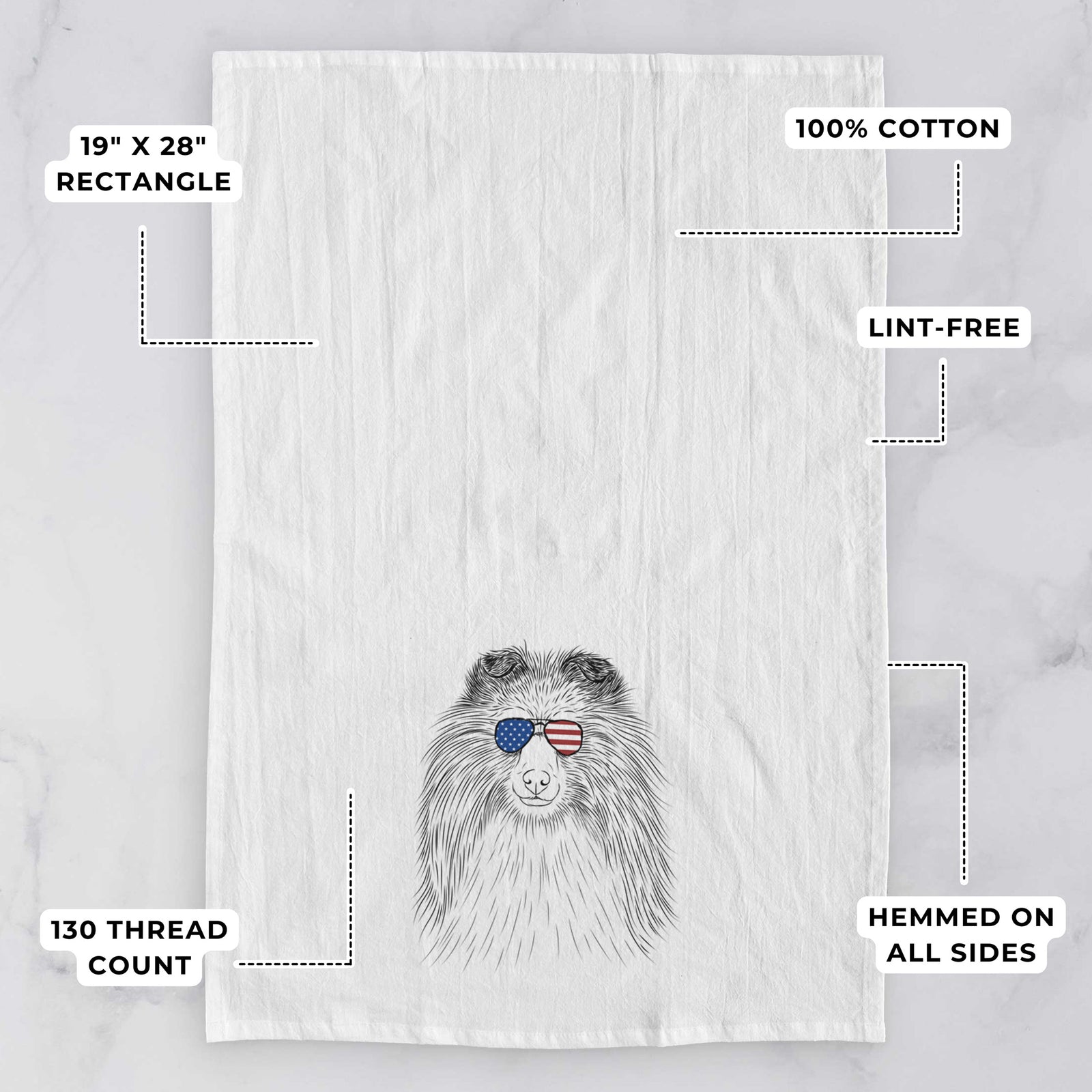 Hand-drawn sketch of Moxie the Shetland Sheepdog wearing American flag sunglasses on a tea towel, with feature callouts: 19 x 28 inch rectangle, 100% cotton, lint-free, 120 thread count, hemmed on all sides