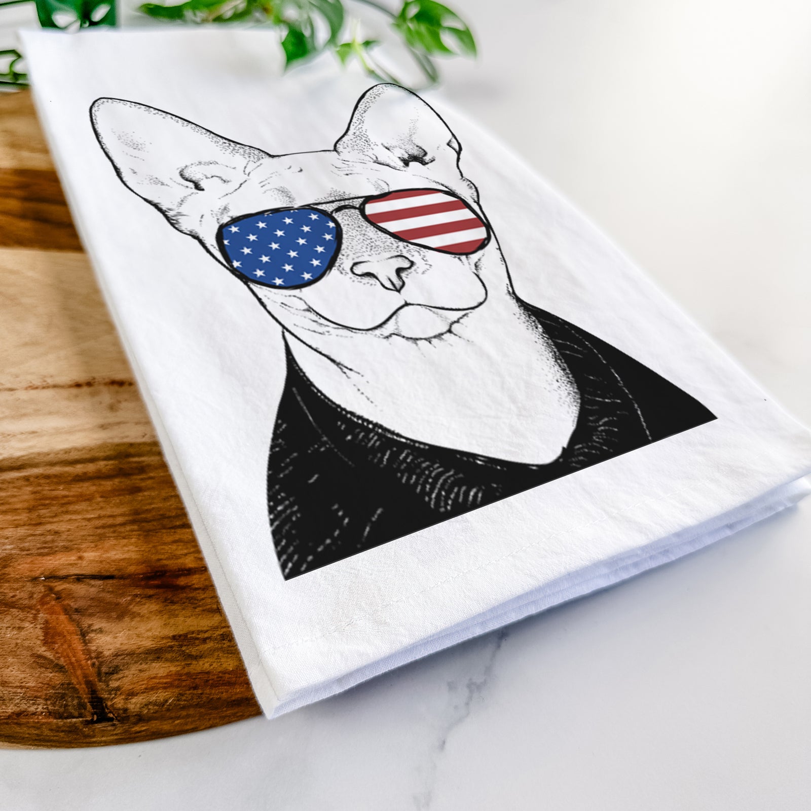 Hand-drawn sketch of Oliver Watson the Sphynx Cat wearing American flag sunglasses on a tea towel