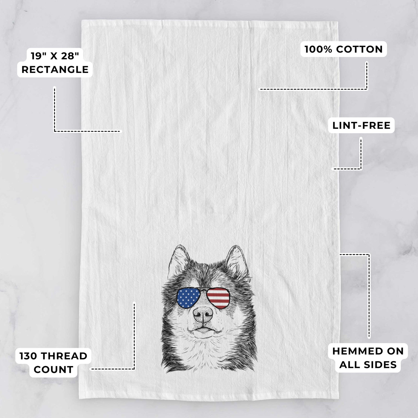 Hand-drawn sketch of Oskar the Canadian Eskimo Dog wearing American flag sunglasses on a tea towel, with feature callouts: 19 x 28 inch rectangle, 100% cotton, lint-free, 120 thread count, hemmed on all sides