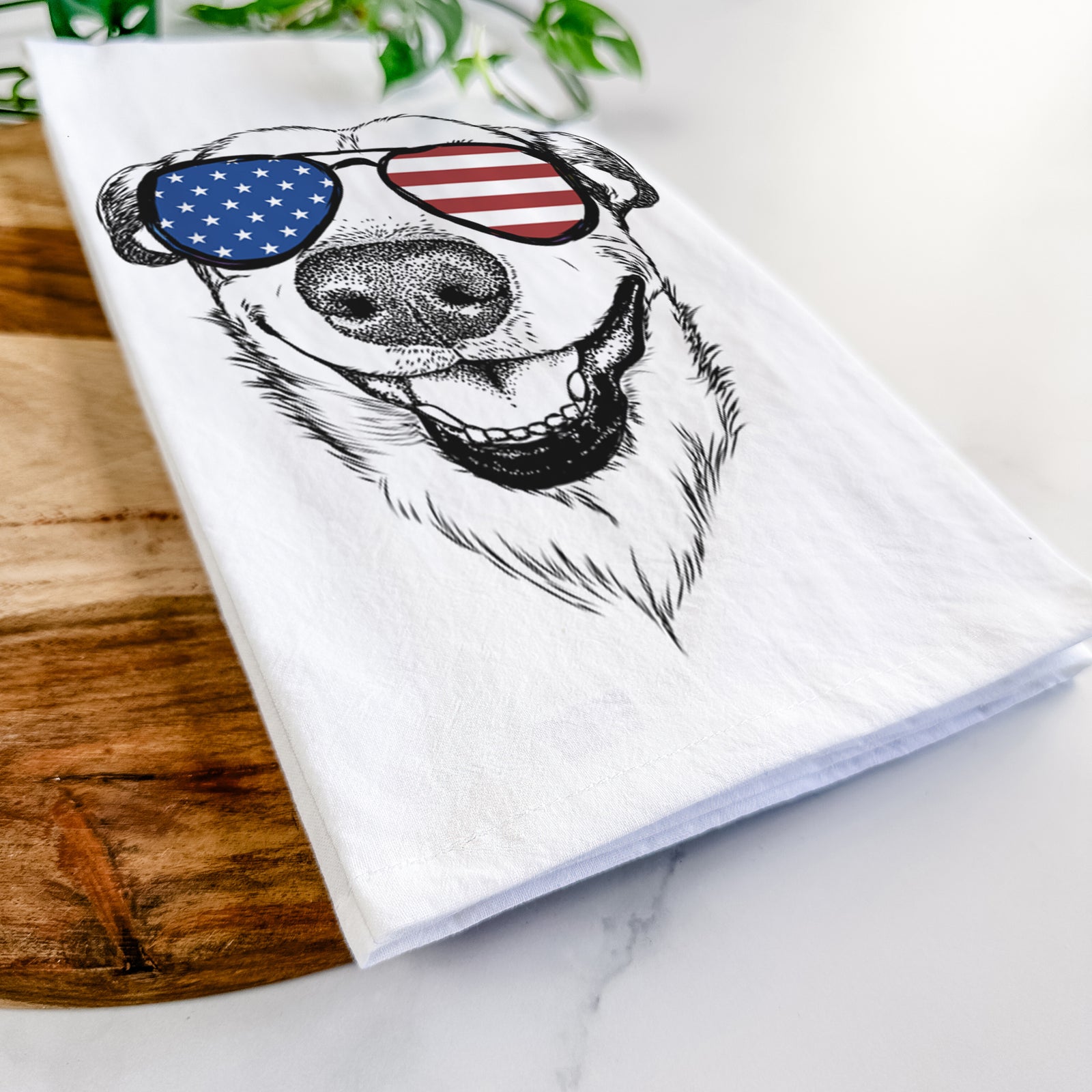 Hand-drawn sketch of Petrah the Staffy Mix wearing American flag sunglasses on a tea towel