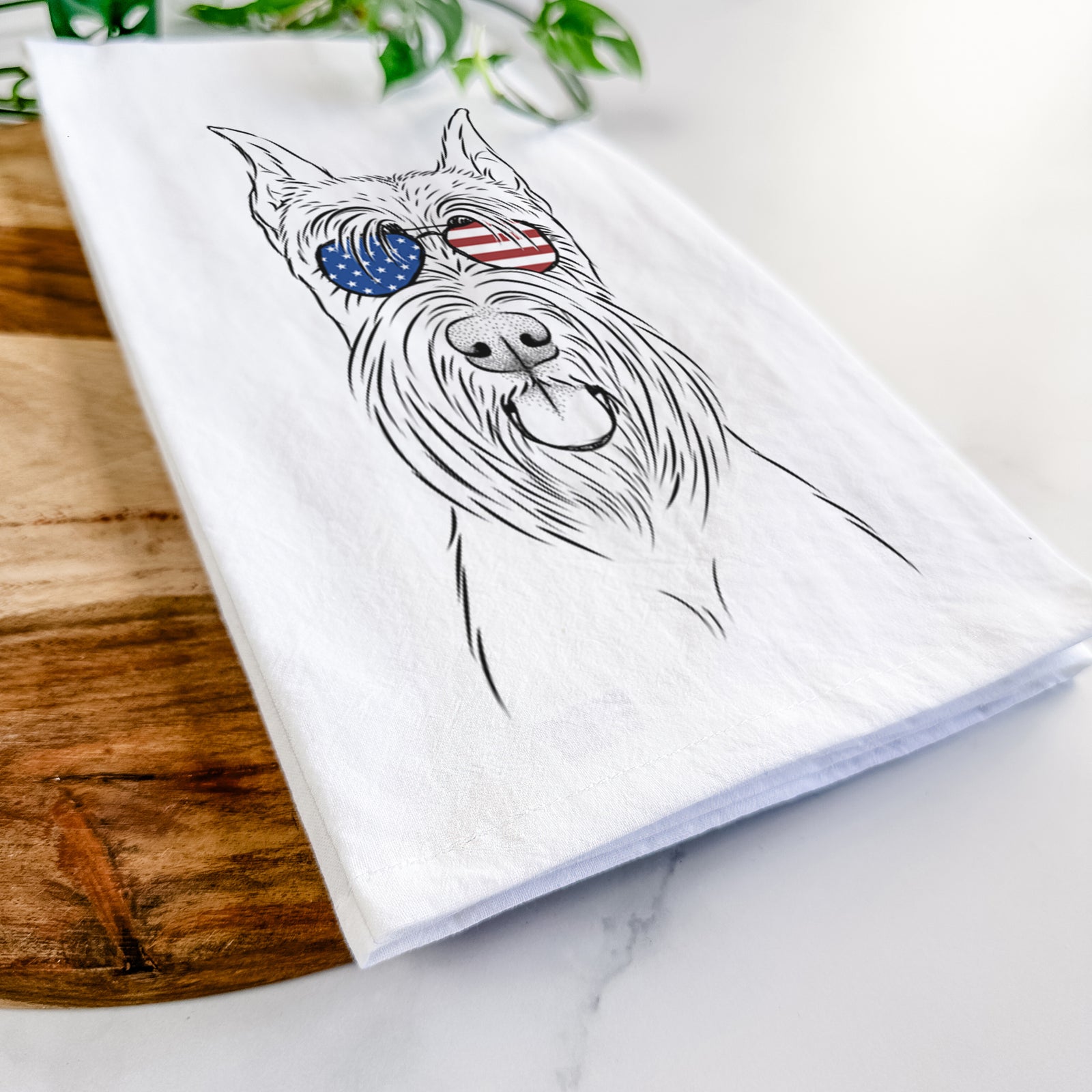 Hand-drawn sketch of Samuel the Standard Schnauzer wearing American flag sunglasses on a tea towel