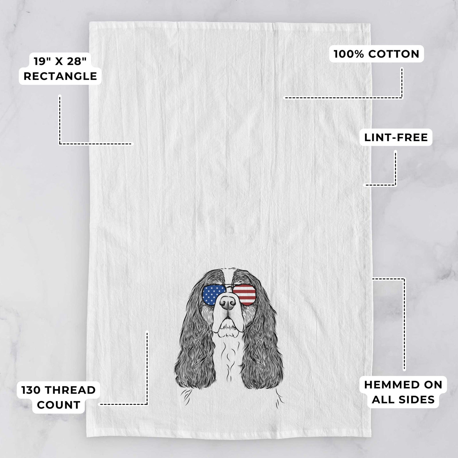 Hand-drawn sketch of Sebastian the Cavalier King Charles Spaniel wearing American flag sunglasses on a tea towel, with feature callouts: 19 x 28 inch rectangle, 100% cotton, lint-free, 120 thread count, hemmed on all sides