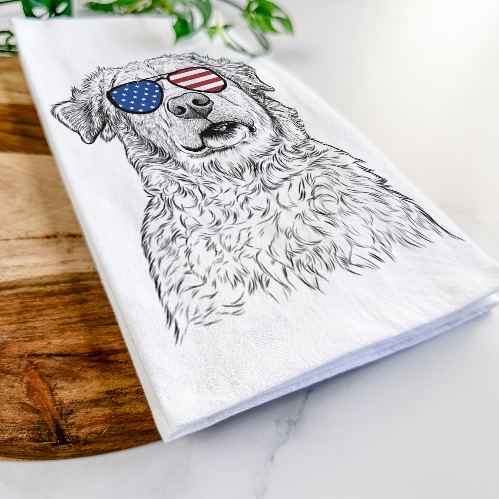 Hand-drawn sketch of Smokey Jam the Middle Eastern Village Dog wearing American flag sunglasses on a tea towel