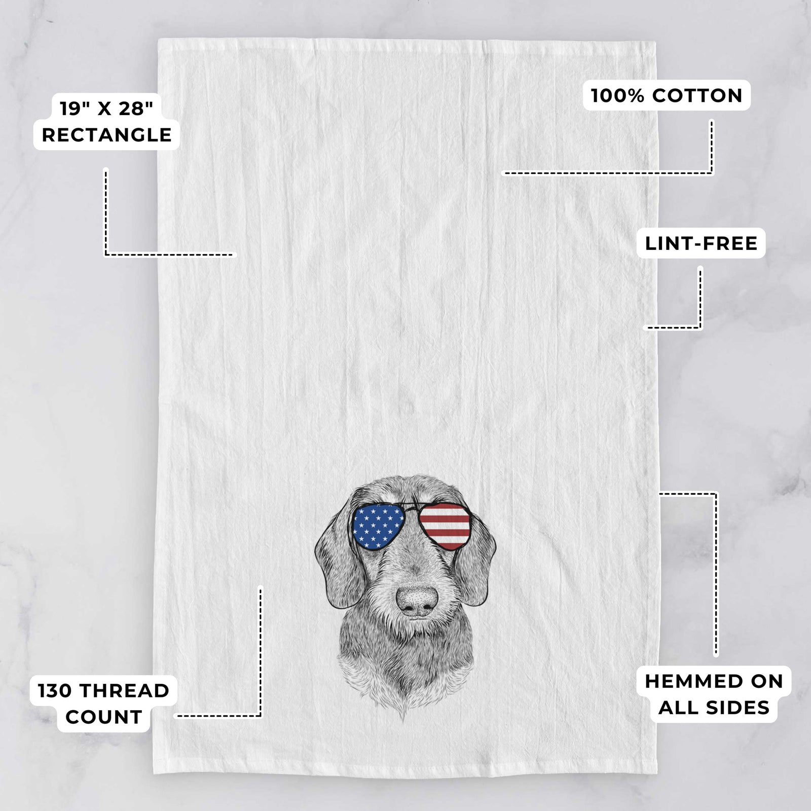 Hand-drawn sketch of Truman the Wirehaired Dachshund wearing American flag sunglasses on a tea towel, with feature callouts: 19 x 28 inch rectangle, 100% cotton, lint-free, 120 thread count, hemmed on all sides