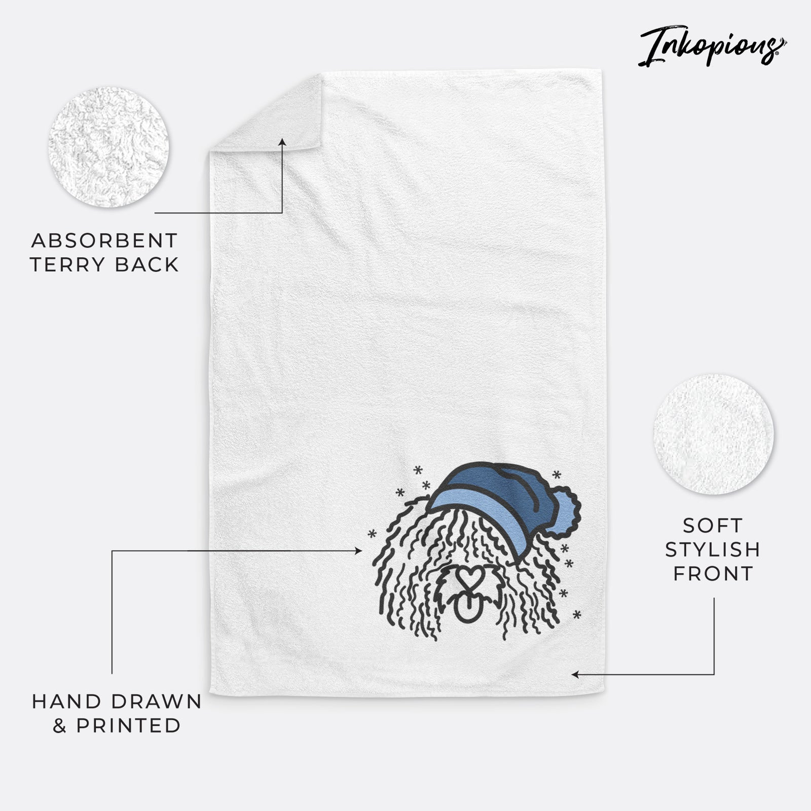 Minimalist line drawing of Alba the Spanish Water Dog wearing a winter beanie on a decorative hand towel