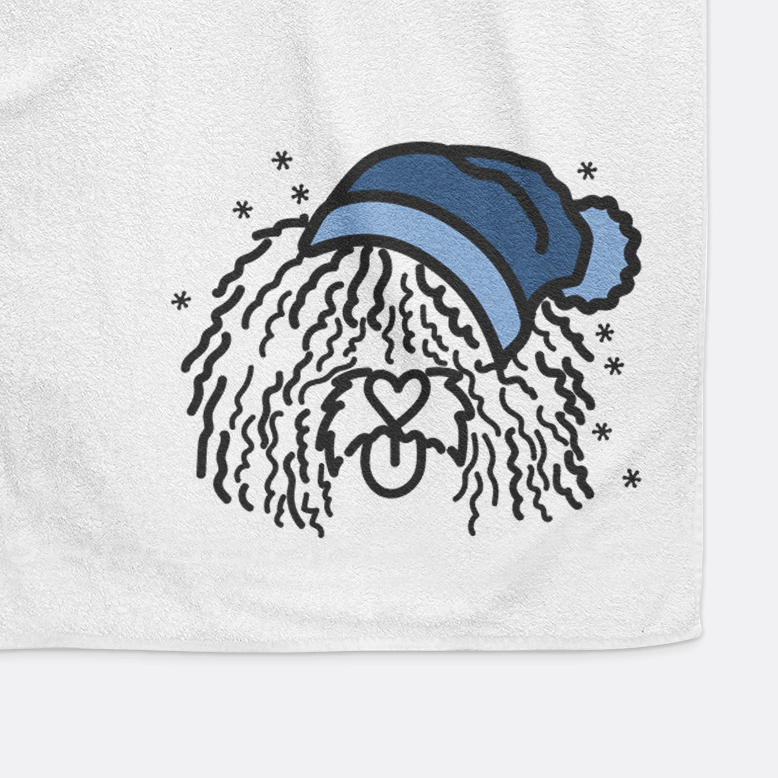 Minimalist line drawing of Alba the Spanish Water Dog wearing a winter beanie on a decorative hand towel