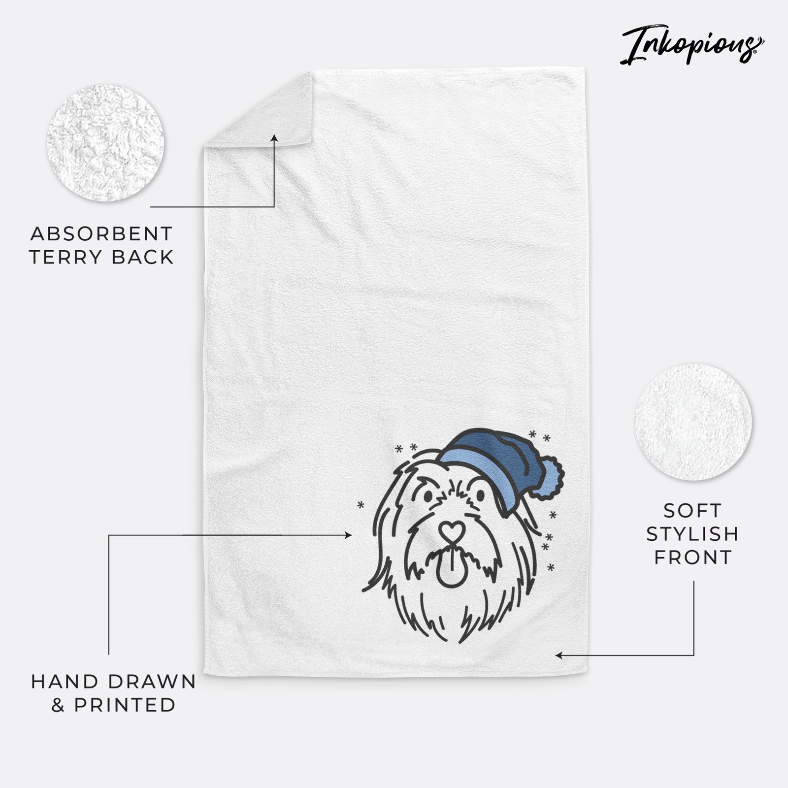 Minimalist line drawing of Tucker the Bearded Collie wearing a winter beanie on a decorative hand towel