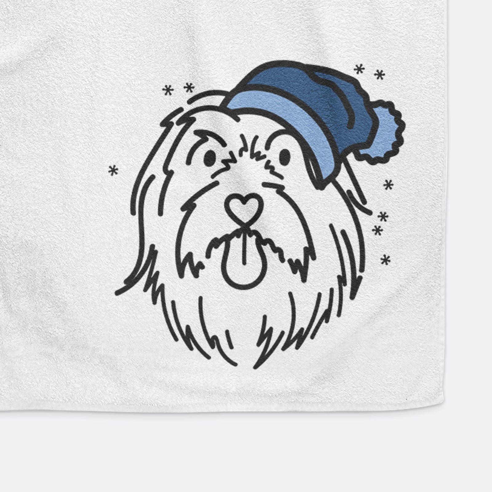 Minimalist line drawing of Tucker the Bearded Collie wearing a winter beanie on a decorative hand towel