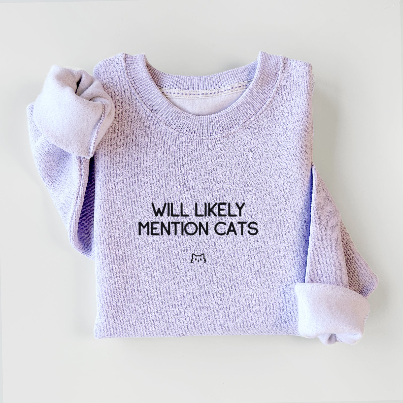 'Will Likely Mention Cats' design on an Ice Purple knit sweatshirt