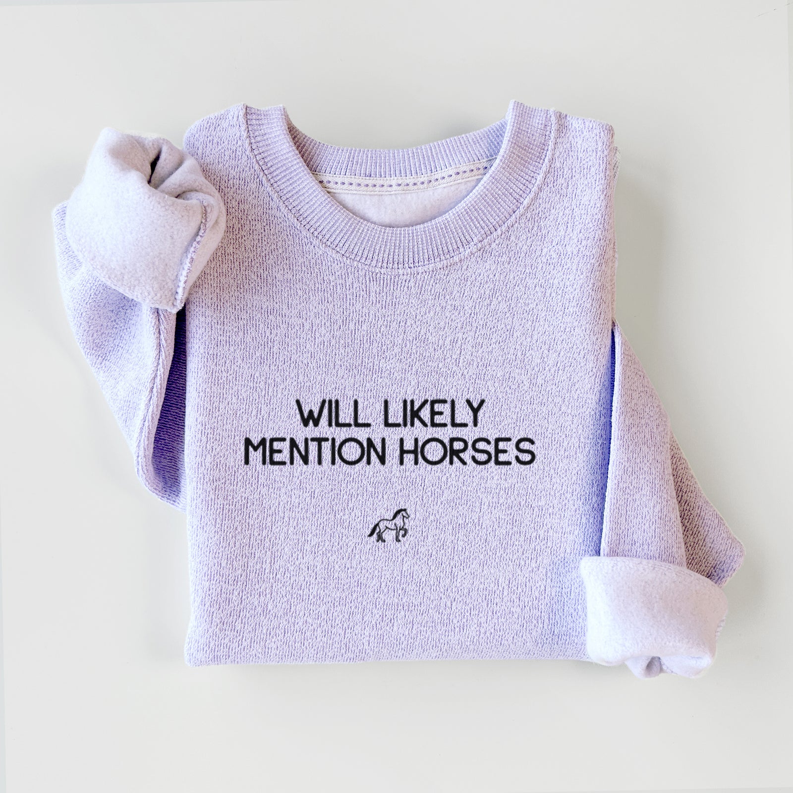 'Will Likely Mention Horses' design on an Ice Purple knit sweatshirt