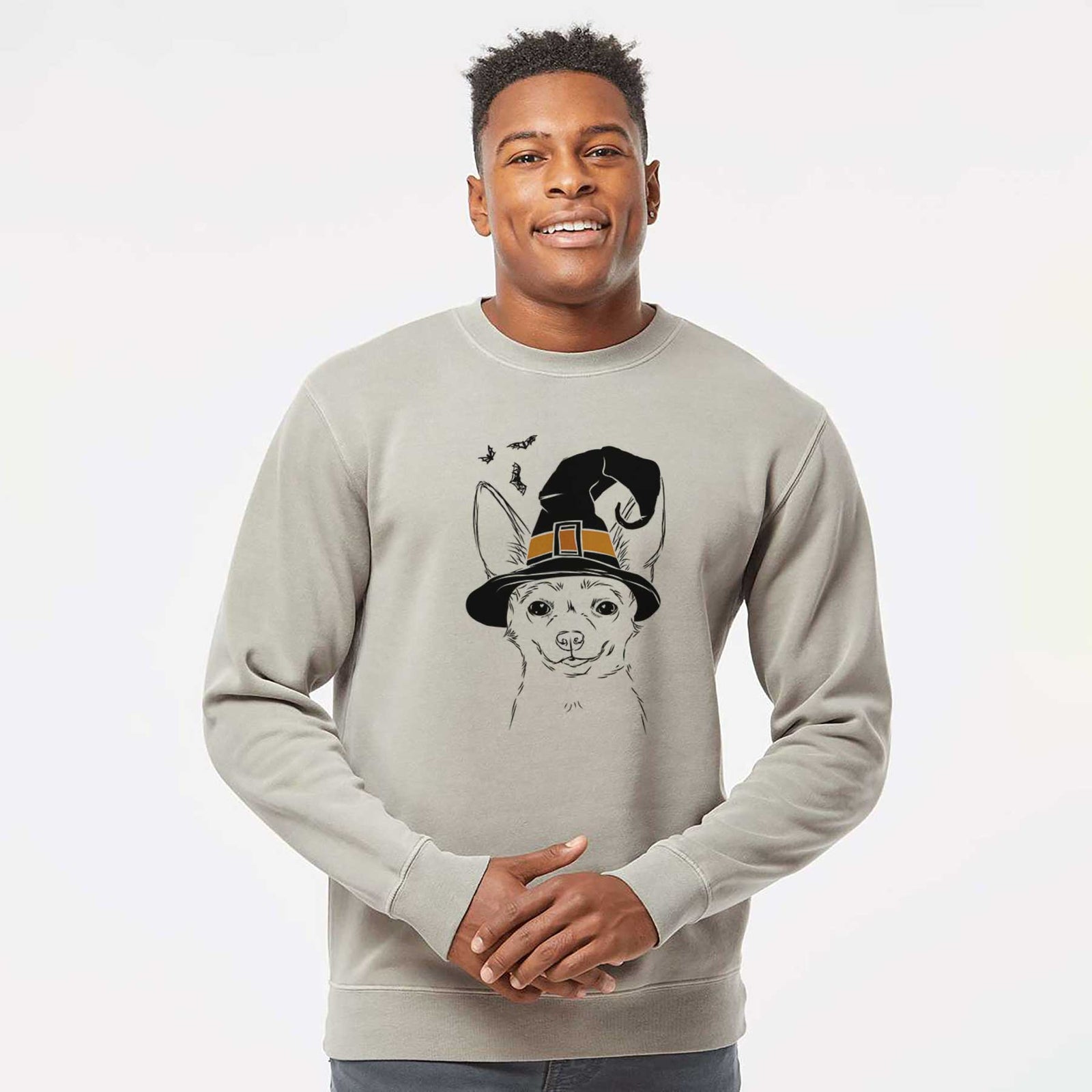 Hand-drawn sketch of Amos the Chihuahua wearing a witch hat on a Cement Unisex pigment dyed crew sweatshirt