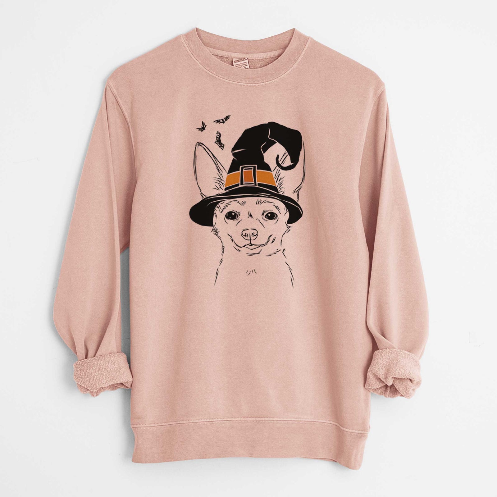 Hand-drawn sketch of Amos the Chihuahua wearing a witch hat on a Dusty Pink Unisex pigment dyed crew sweatshirt