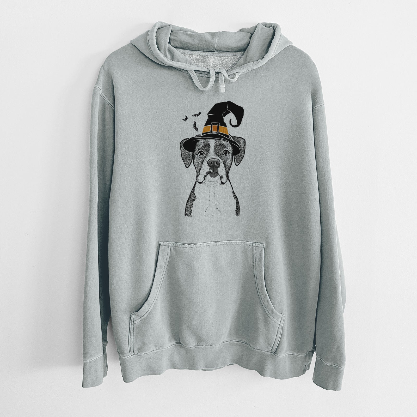 Hand-drawn sketch of Annie the Boxer wearing a witch hat on a Sage Unisex pigment dyed hoodie