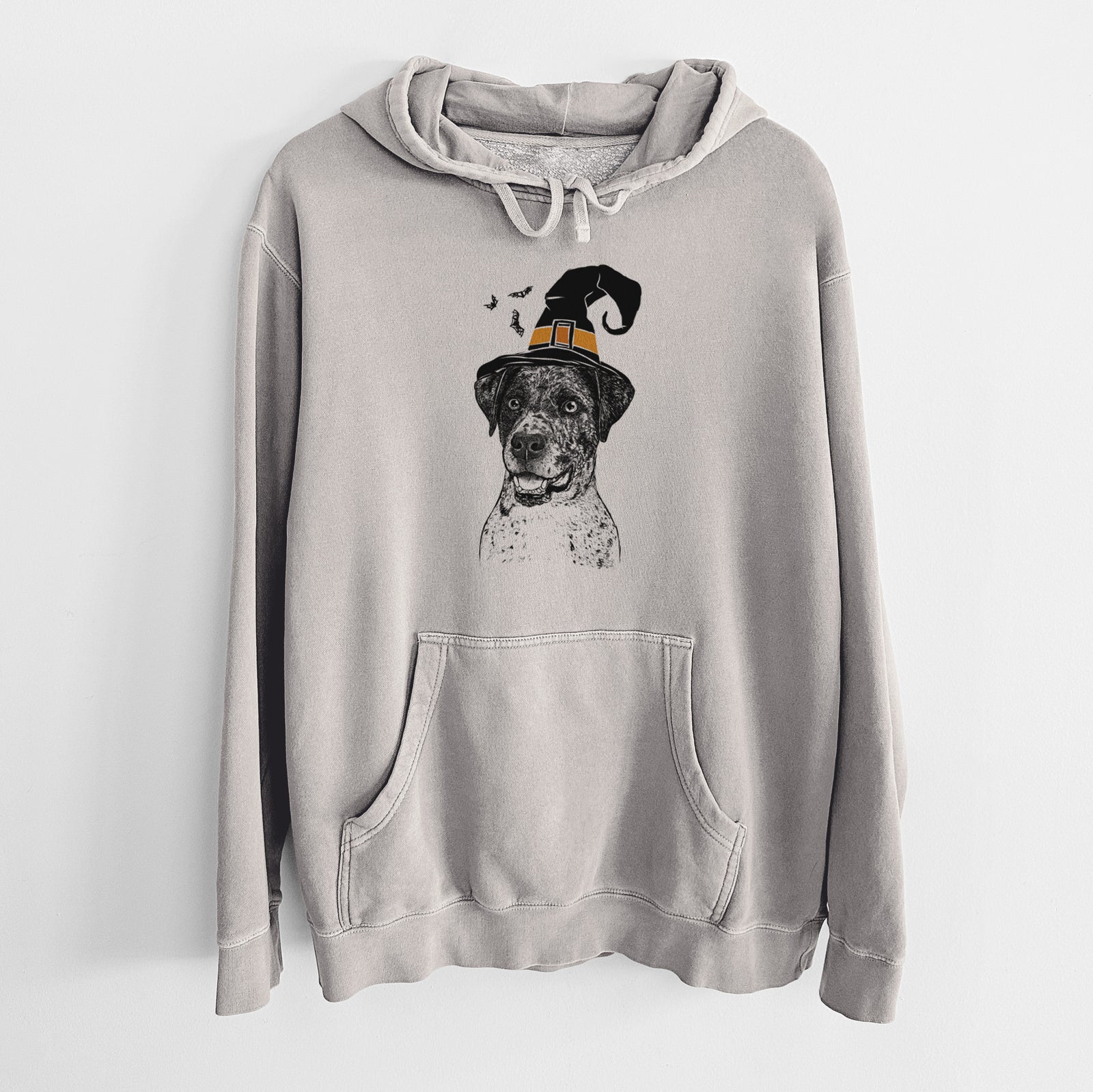 Hand-drawn sketch of Argos the Catahoula wearing a witch hat on a Cement Unisex pigment dyed hoodie