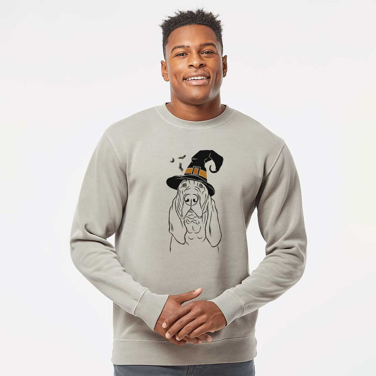 Hand-drawn sketch of Baron the Bloodhound wearing a witch hat on a Cement Unisex pigment dyed crew sweatshirt