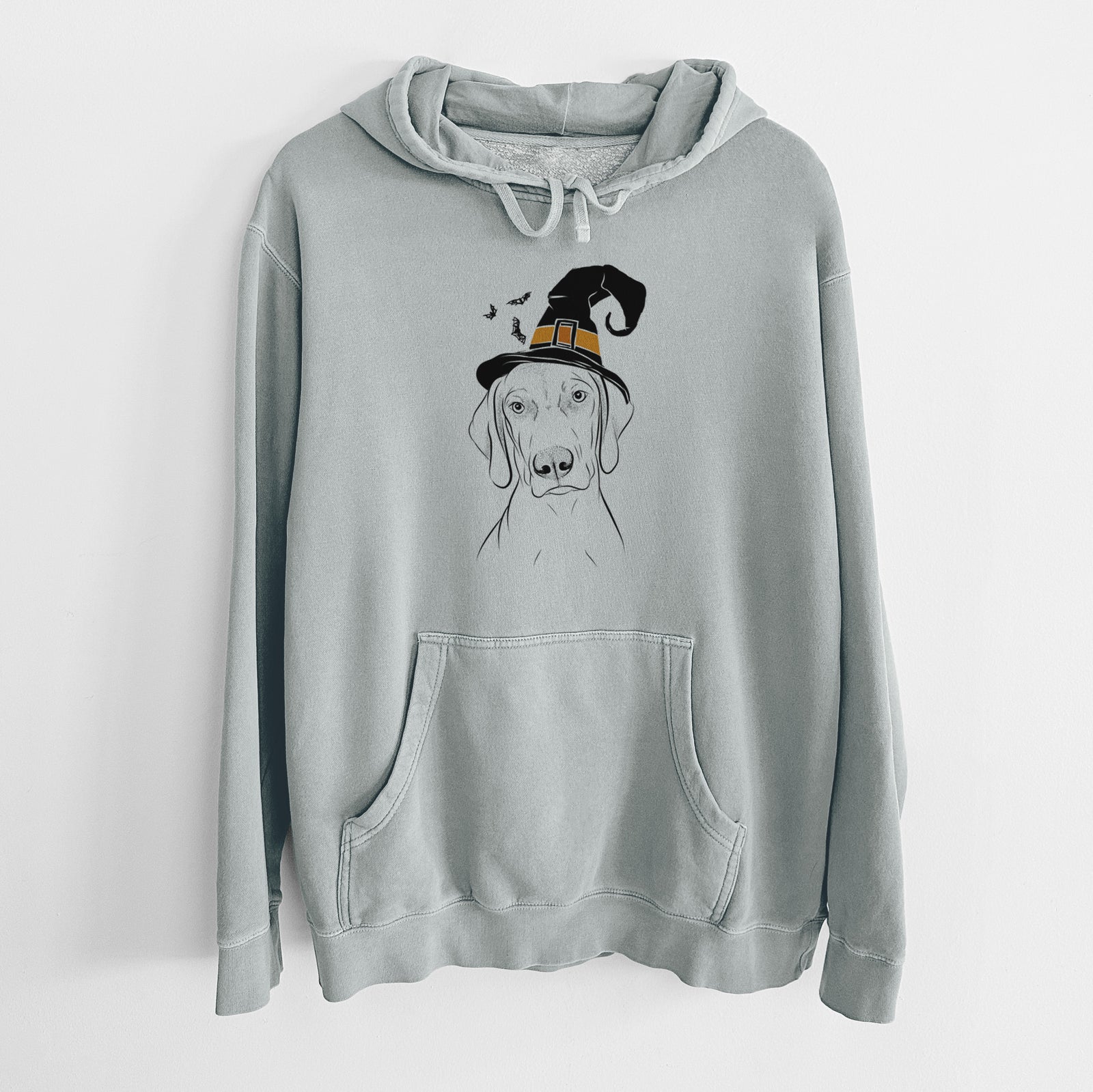 Hand-drawn sketch of Benelli the Vizsla wearing a witch hat on a Sage Unisex pigment dyed hoodie