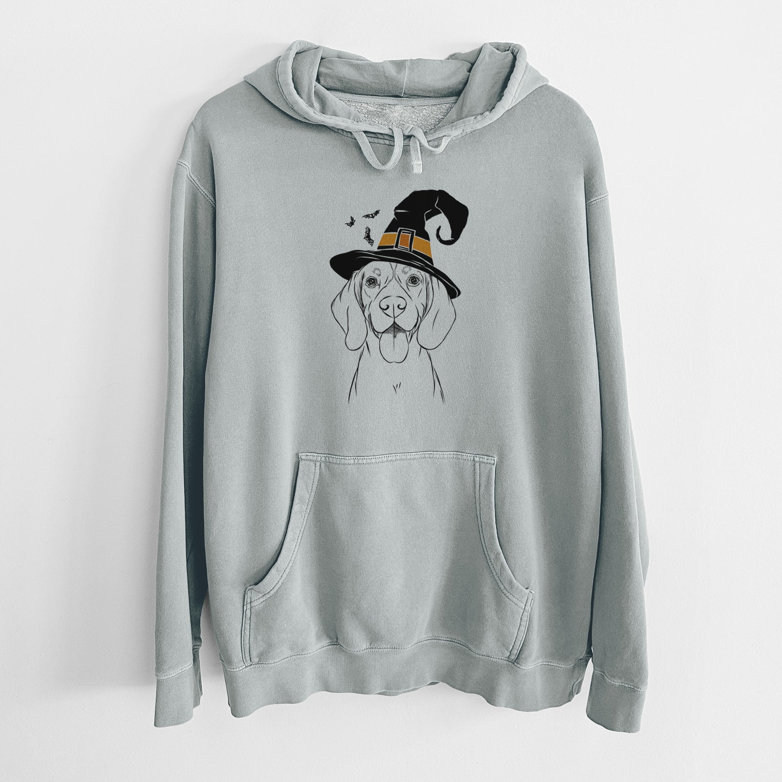 Hand-drawn sketch of Bogie the Beagle wearing a witch hat on a Sage Unisex pigment dyed hoodie