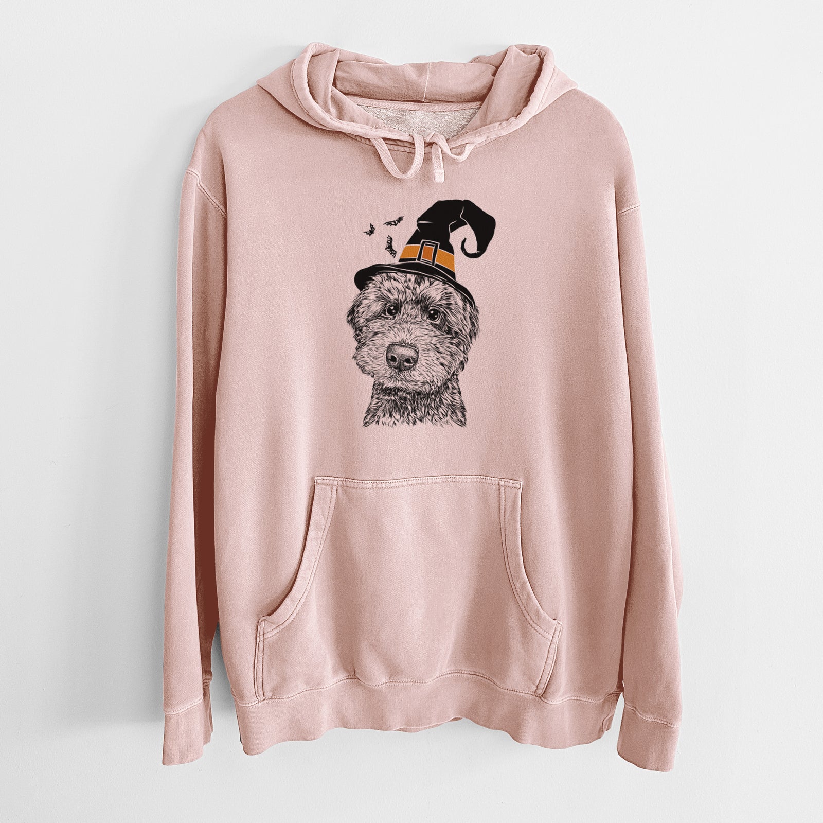 Hand-drawn sketch of Bowser the Whoodle wearing a witch hat on a Dusty Pink Unisex pigment dyed hoodie