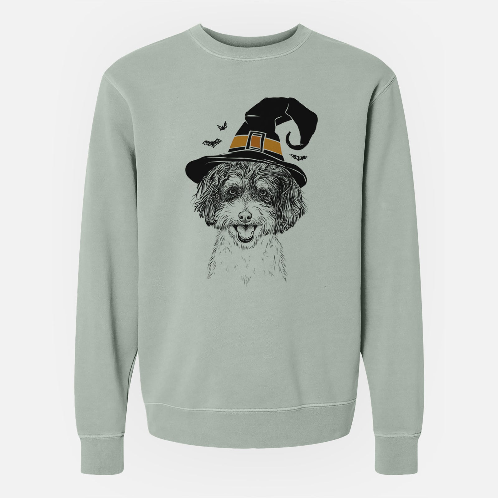 Hand-drawn sketch of Carlos the Cavapoo wearing a witch hat on a Sage Unisex pigment dyed crew sweatshirt