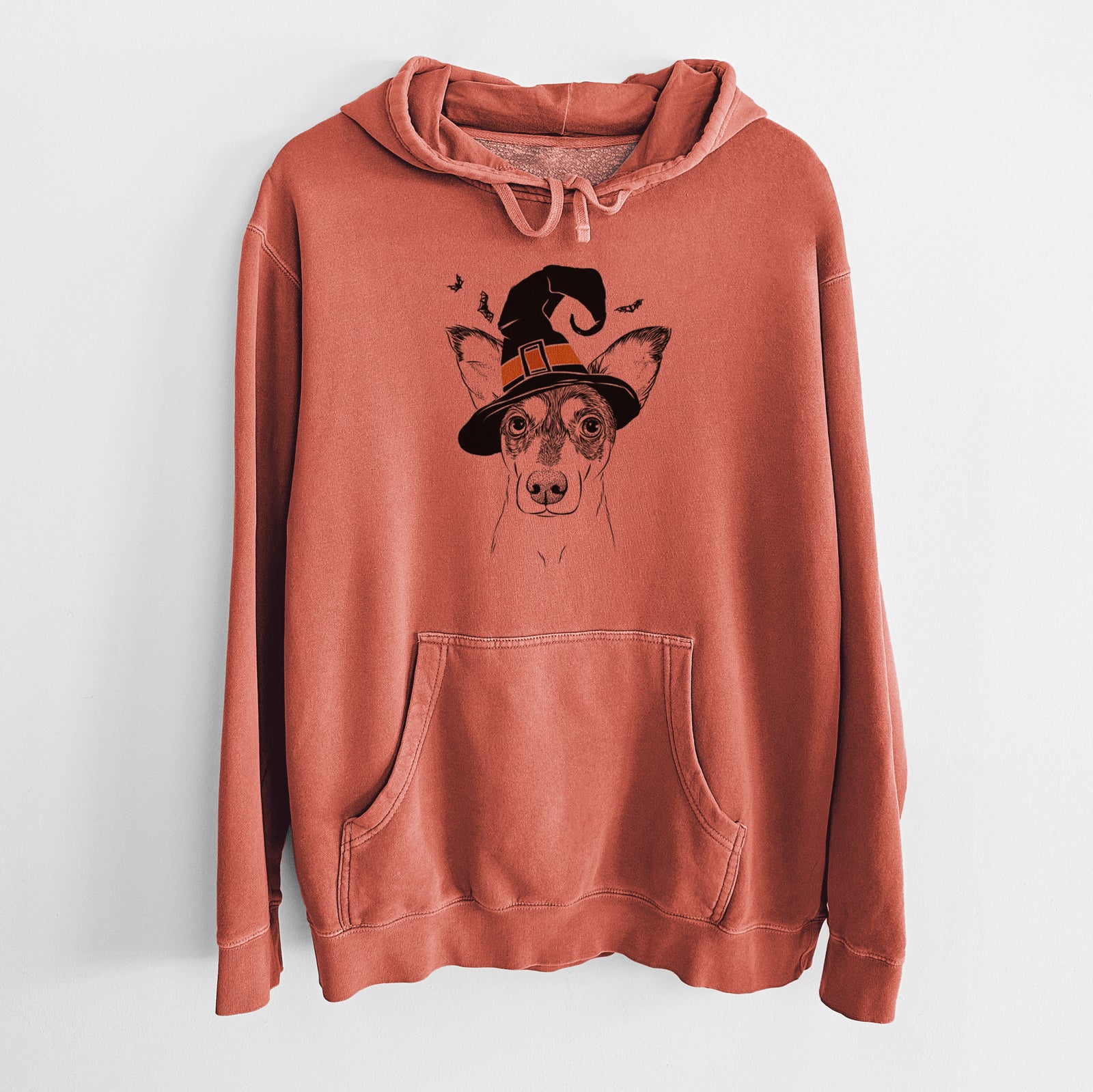 Hand-drawn sketch of Chloe the Doxie Mix wearing a witch hat on an Amber Unisex pigment dyed hoodie