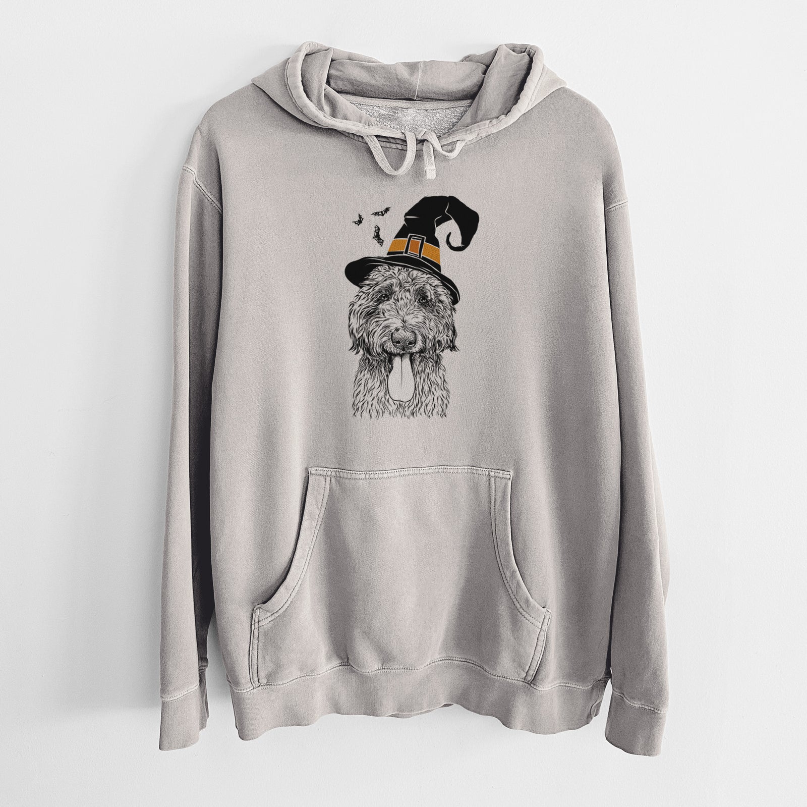 Hand-drawn sketch of CiCi Paulk the Aussiedoodle wearing a witch hat on a Cement Unisex pigment dyed hoodie