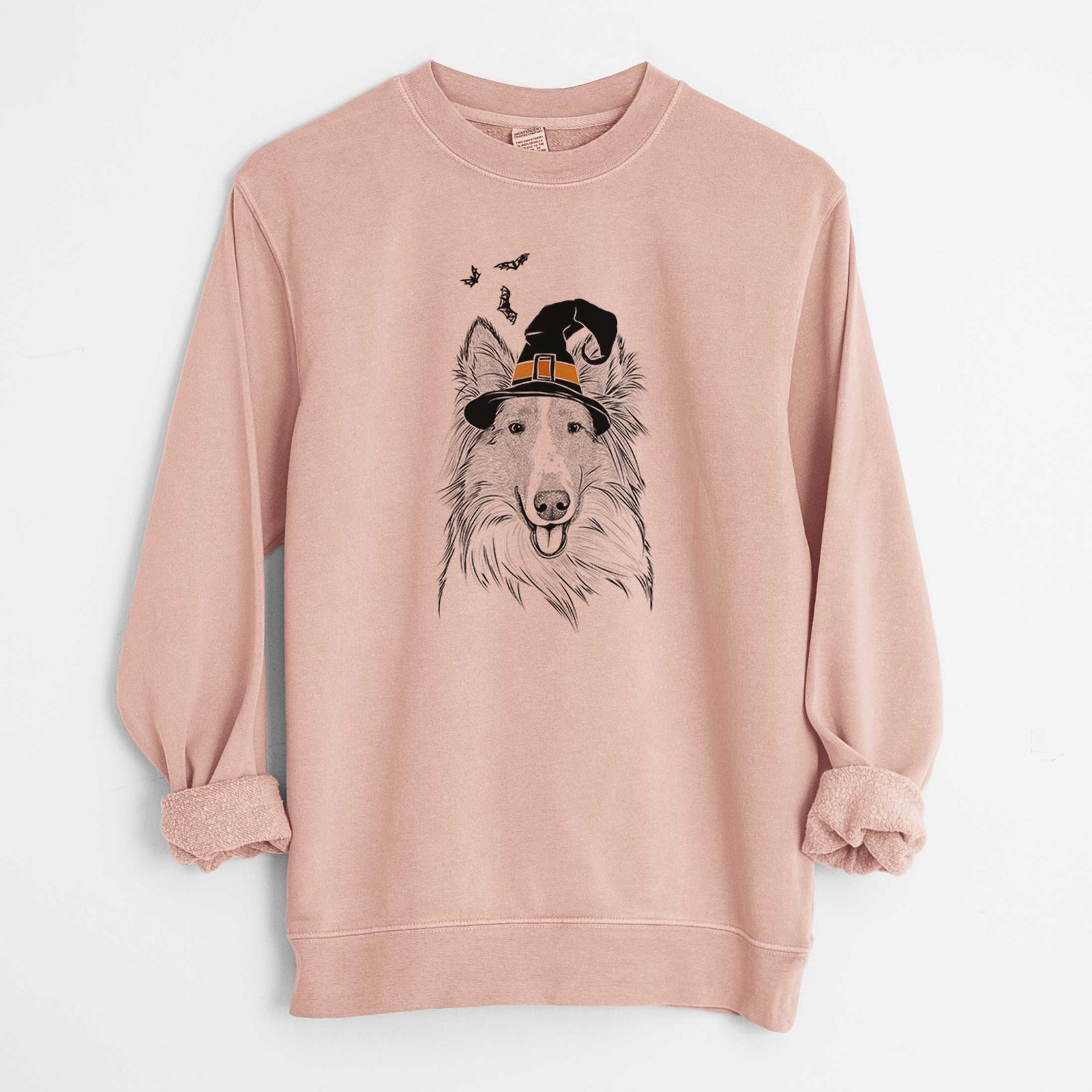 Hand-drawn sketch of Conrad the Rough Collie wearing a witch hat on a Dusty Pink Unisex pigment dyed crew sweatshirt