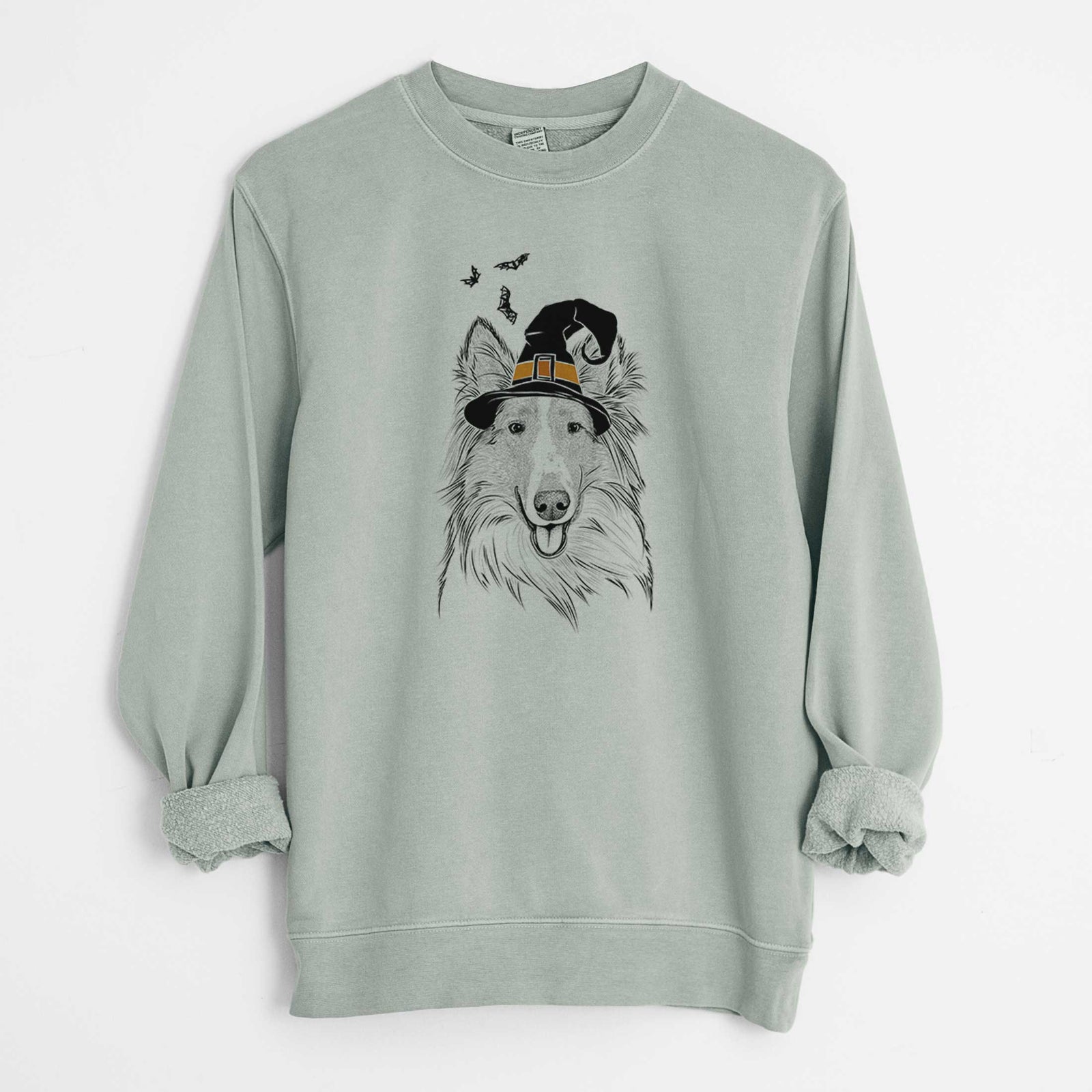 Hand-drawn sketch of Conrad the Rough Collie wearing a witch hat on a Sage Unisex pigment dyed crew sweatshirt