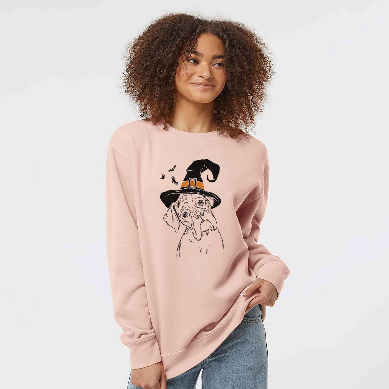 Hand-drawn sketch of Cooper the Boxer wearing a witch hat on a Dusty Pink Unisex pigment dyed crew sweatshirt