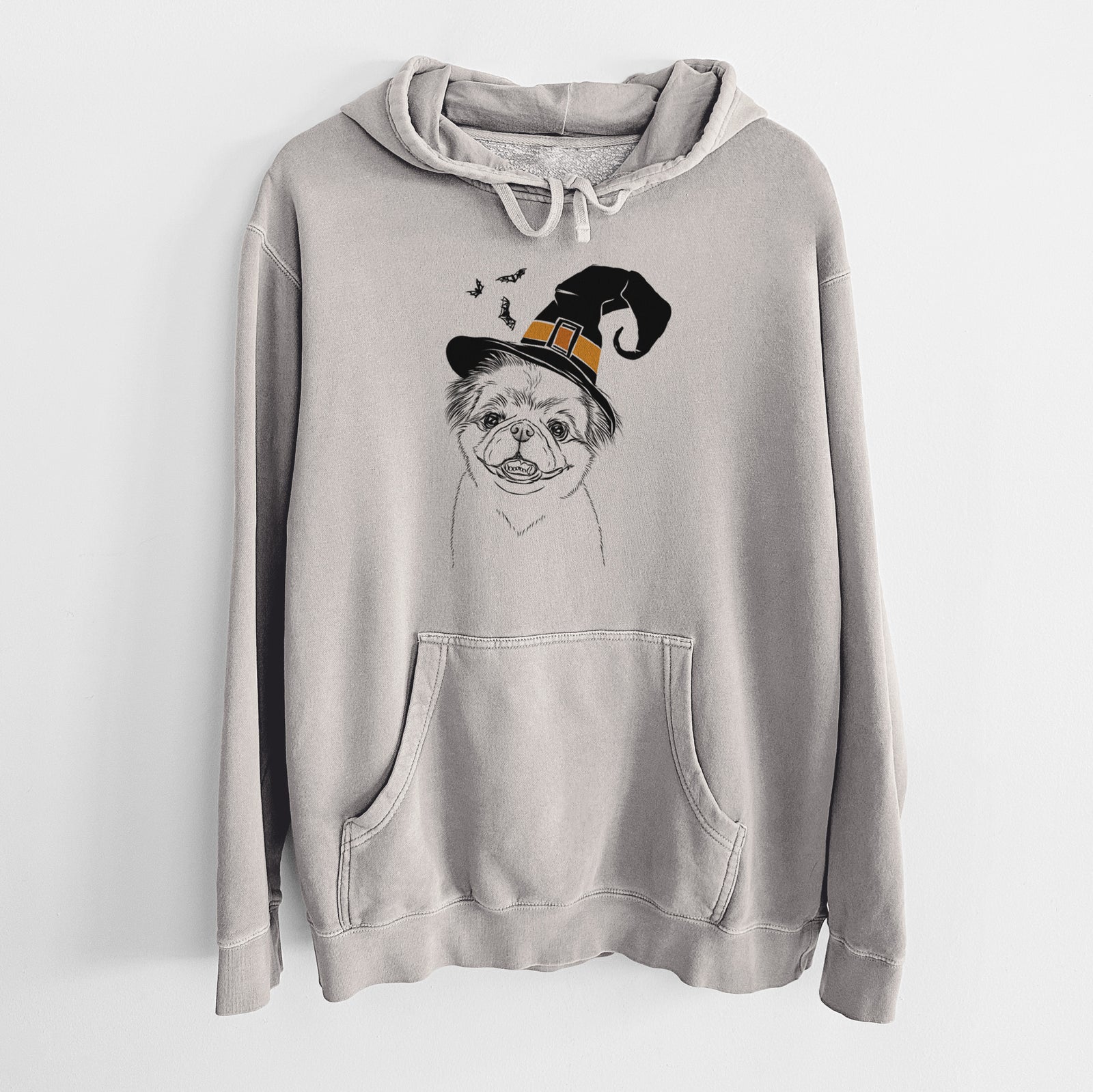 Hand-drawn sketch of Danny the Pekingese wearing a witch hat on a Cement Unisex pigment dyed hoodie