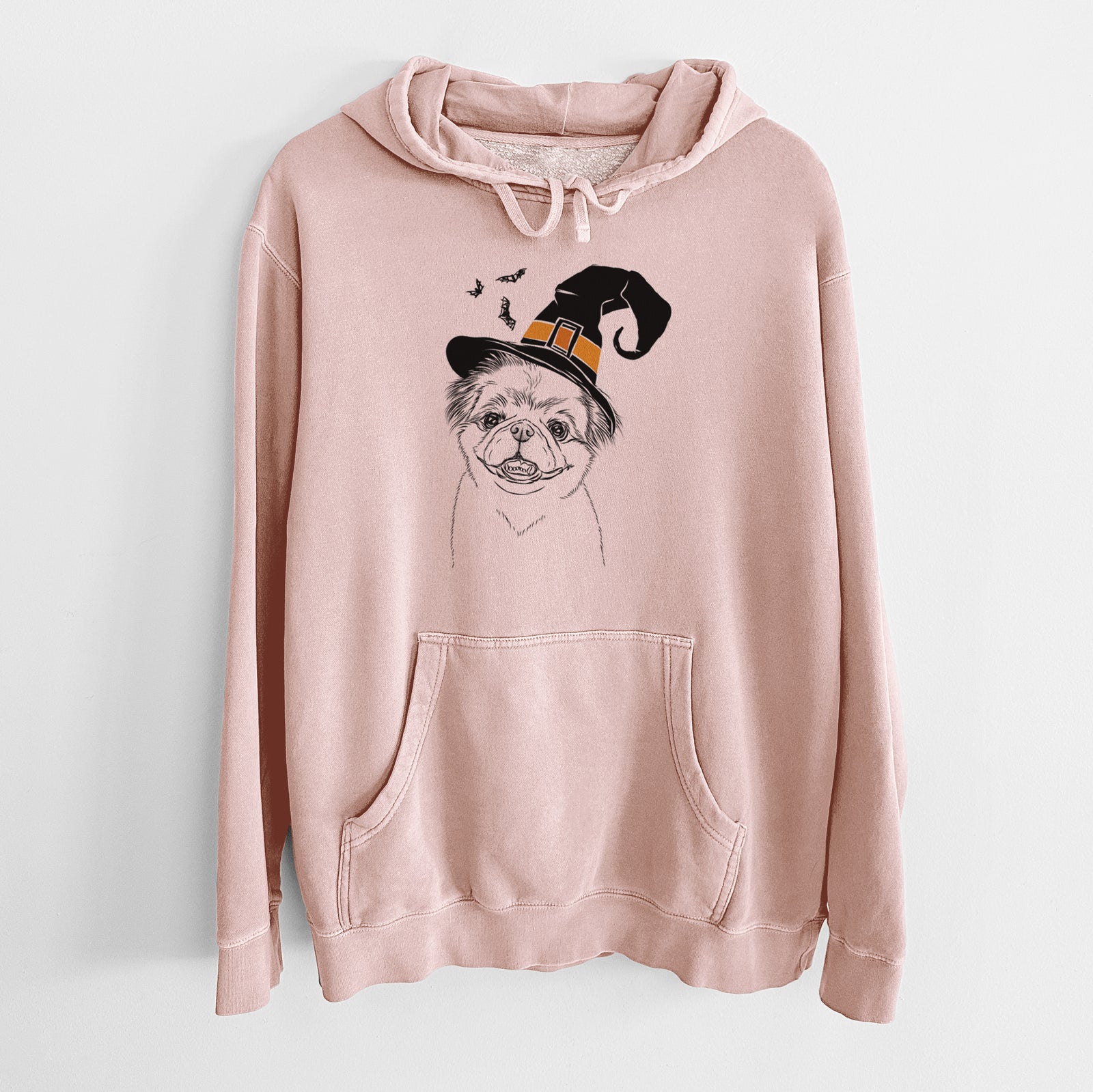 Hand-drawn sketch of Danny the Pekingese wearing a witch hat on a Dusty Pink Unisex pigment dyed hoodie