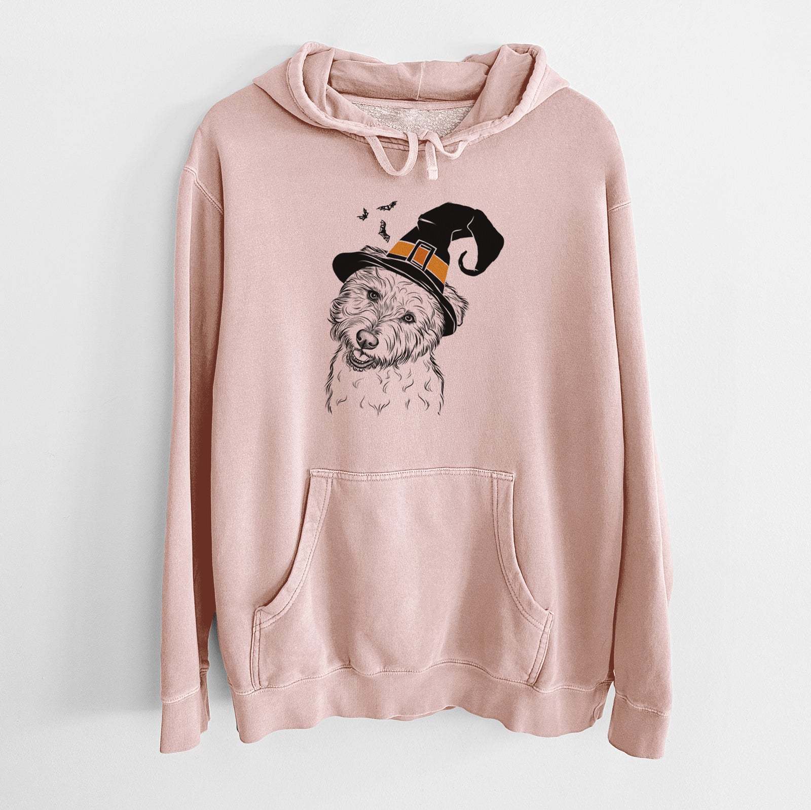 Hand-drawn sketch of Duffy the Glen of Imaal Terrier wearing a witch hat on a Dusty Pink Unisex pigment dyed hoodie