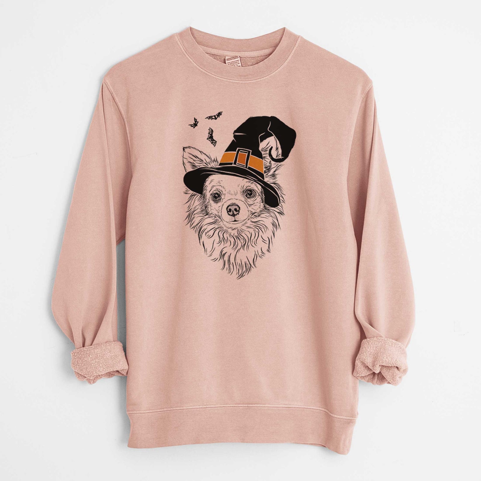Hand-drawn sketch of Emma the Longhaired Chihuahua wearing a witch hat on a Dusty Pink Unisex pigment dyed crew sweatshirt