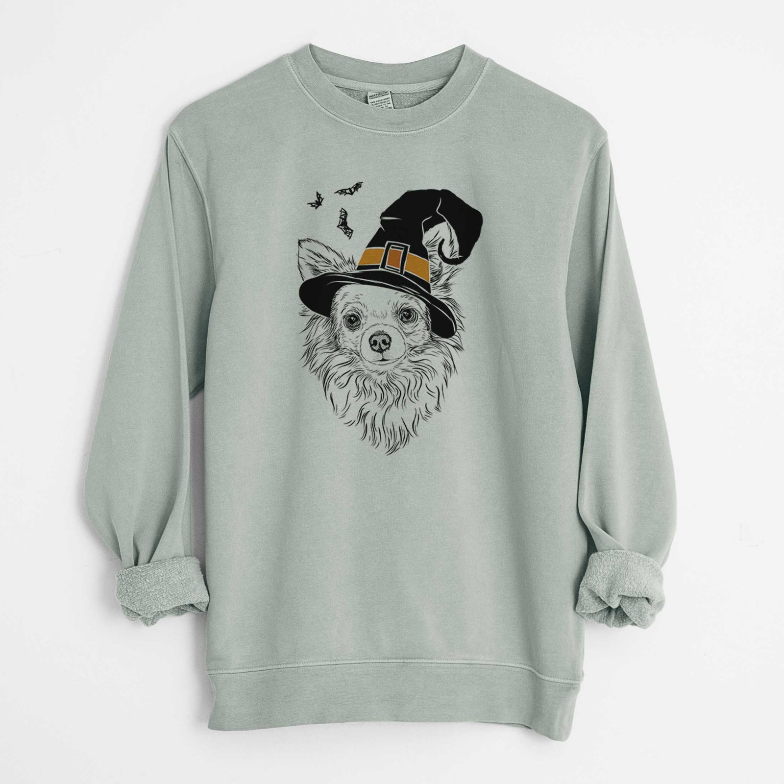 Hand-drawn sketch of Emma the Longhaired Chihuahua wearing a witch hat on a Sage Unisex pigment dyed crew sweatshirt