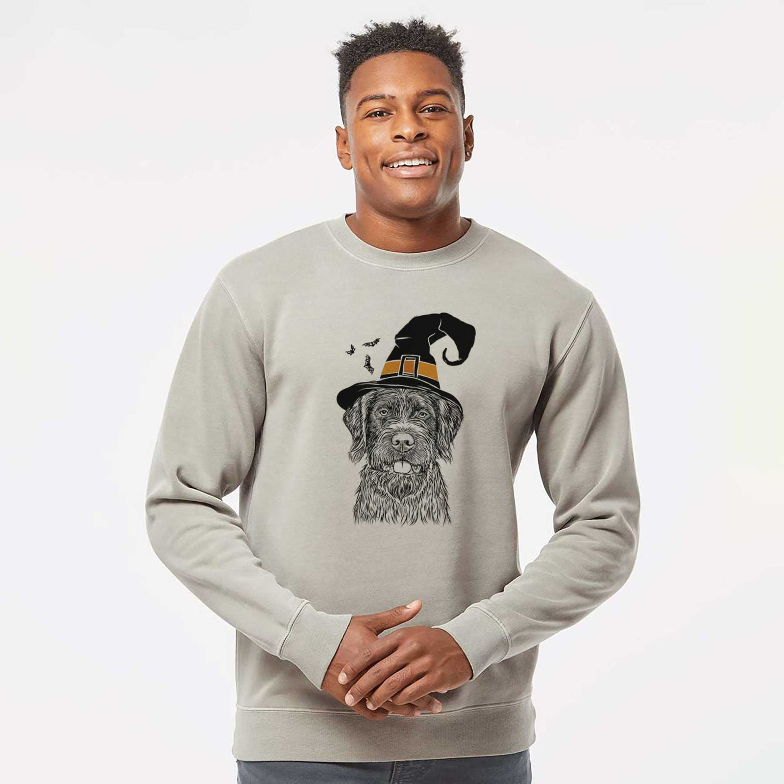 Hand-drawn sketch of Fletcher the Wirehaired Pointing Griffon wearing a witch hat on a Cement Unisex pigment dyed crew sweatshirt