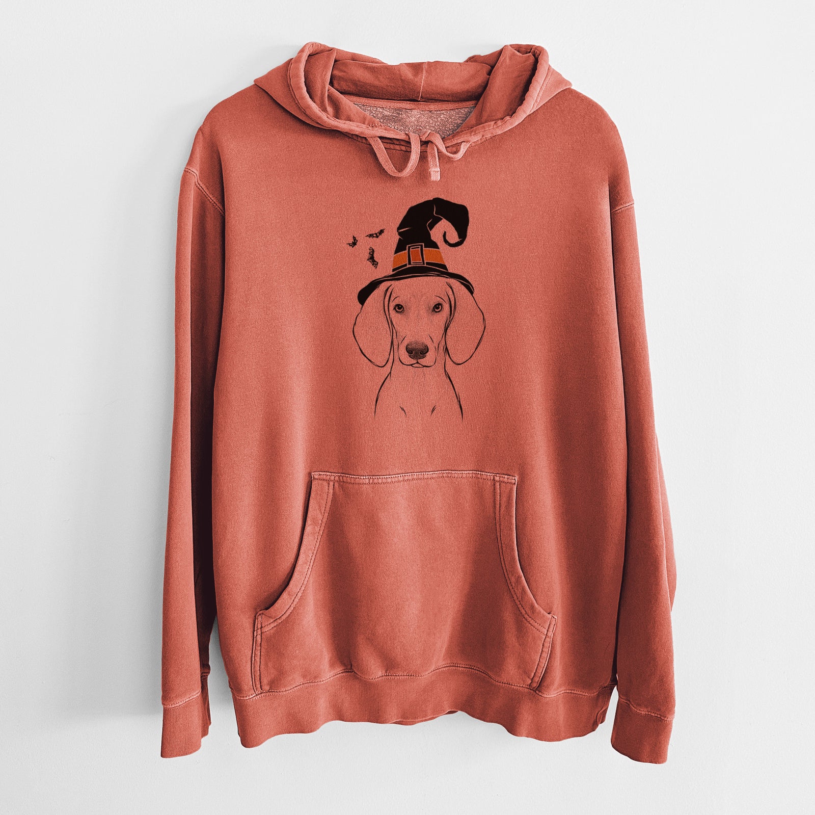 Hand-drawn sketch of Frejya the Weimaraner wearing a witch hat on an Amber Unisex pigment dyed hoodie