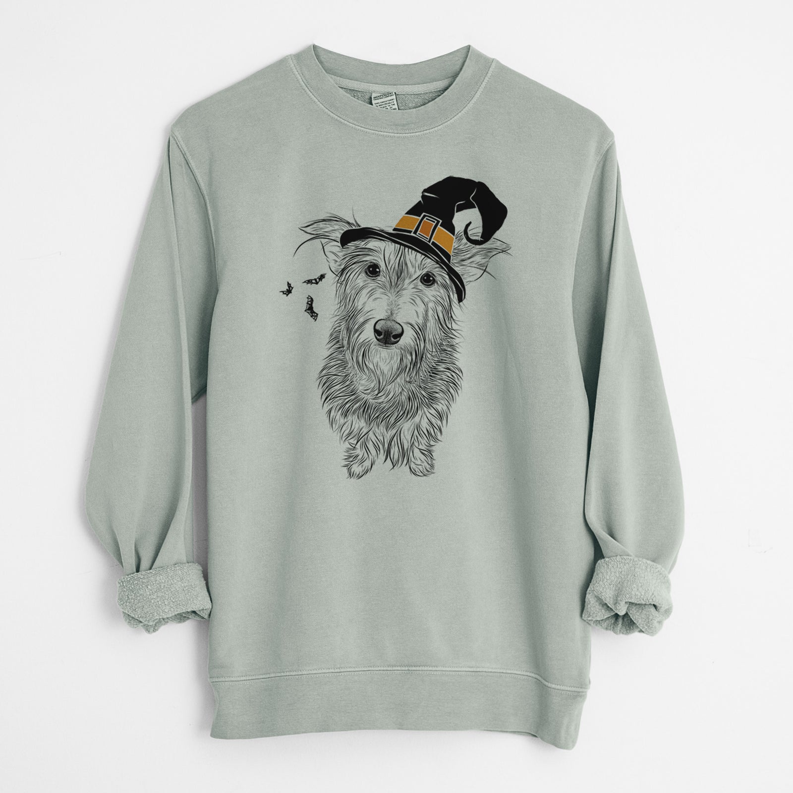 Hand-drawn sketch of Frida Doggo the Rescue Terrier Mix wearing a witch hat on a Sage Unisex pigment dyed crew sweatshirt