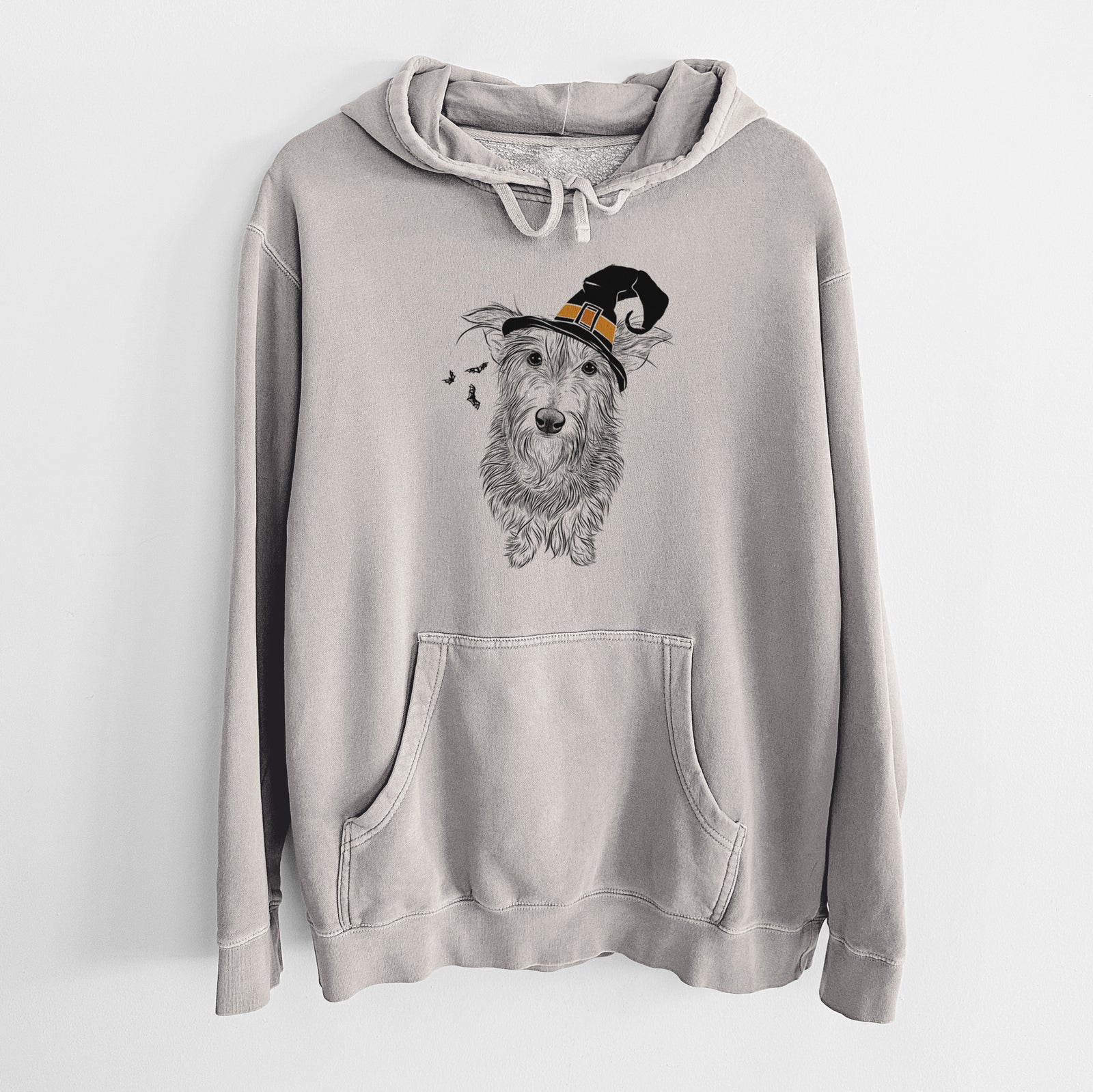 Hand-drawn sketch of Frida Doggo the Rescue Terrier Mix wearing a witch hat on a Cement Unisex pigment dyed hoodie
