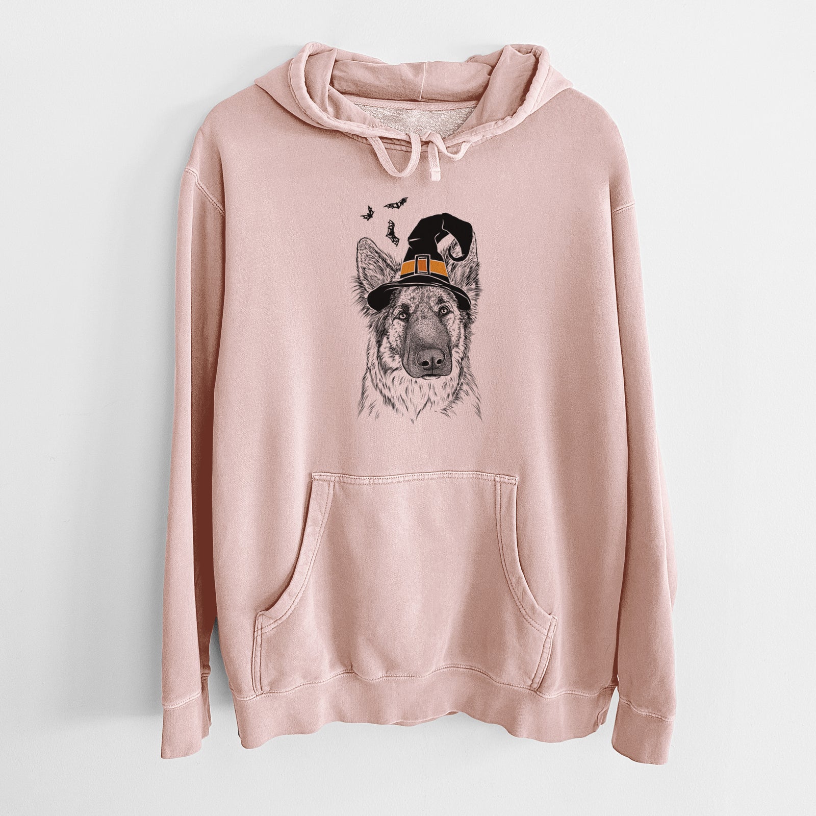 Hand-drawn sketch of Geddy the Shiloh Shepherd wearing a witch hat on a Dusty Pink Unisex pigment dyed hoodie