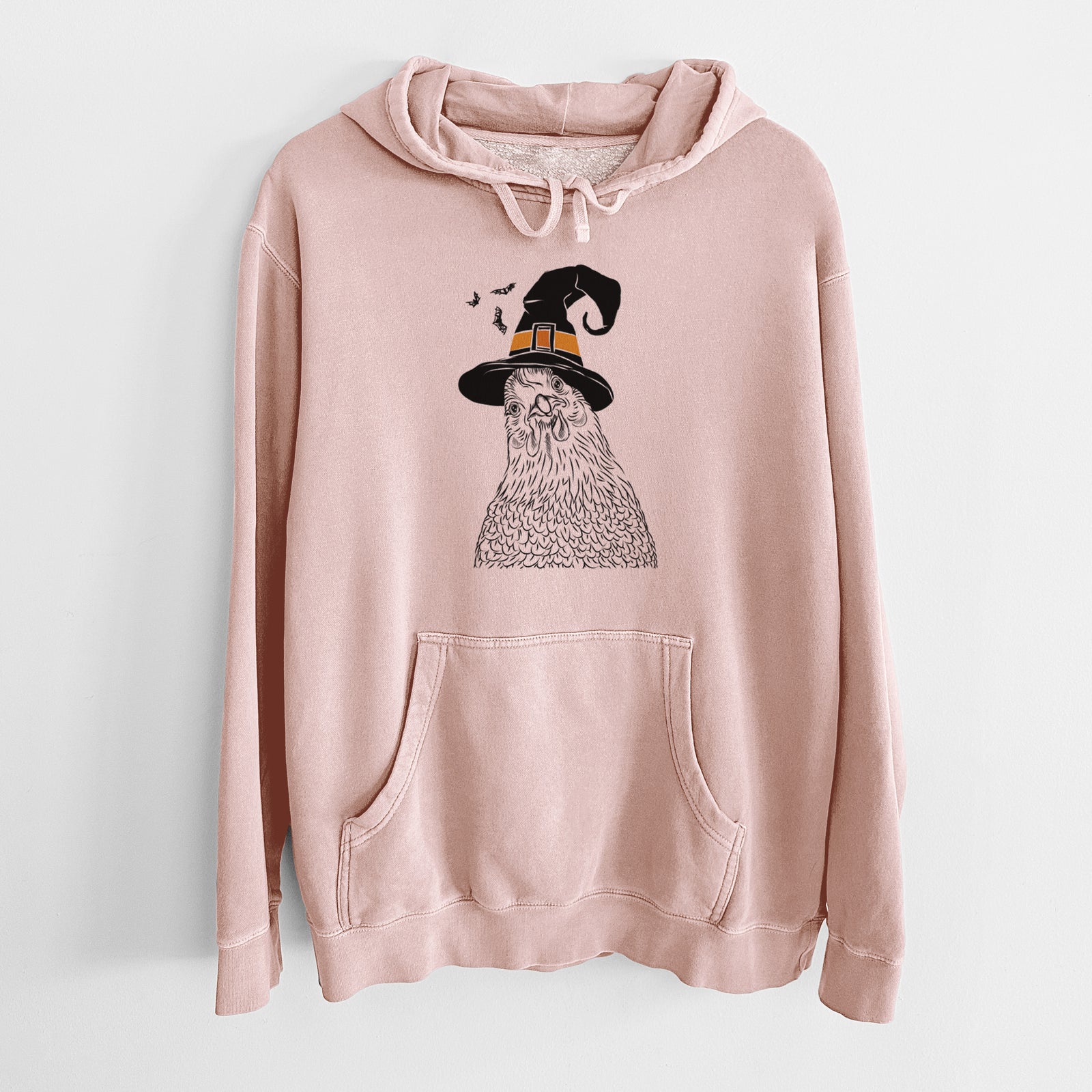 Hand-drawn sketch of Henrietta the Chicken wearing a witch hat on a Dusty Pink Unisex pigment dyed hoodie