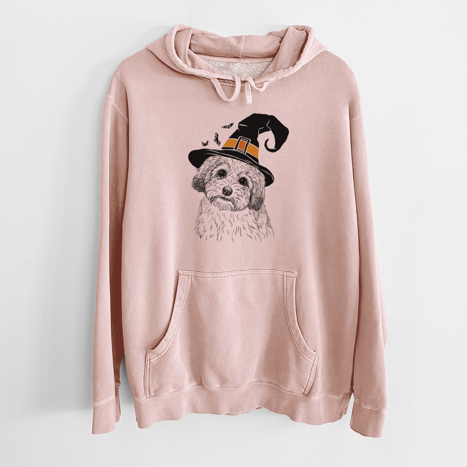 Hand-drawn sketch of Henry the Havanese wearing a witch hat on a Dusty Pink Unisex pigment dyed hoodie
