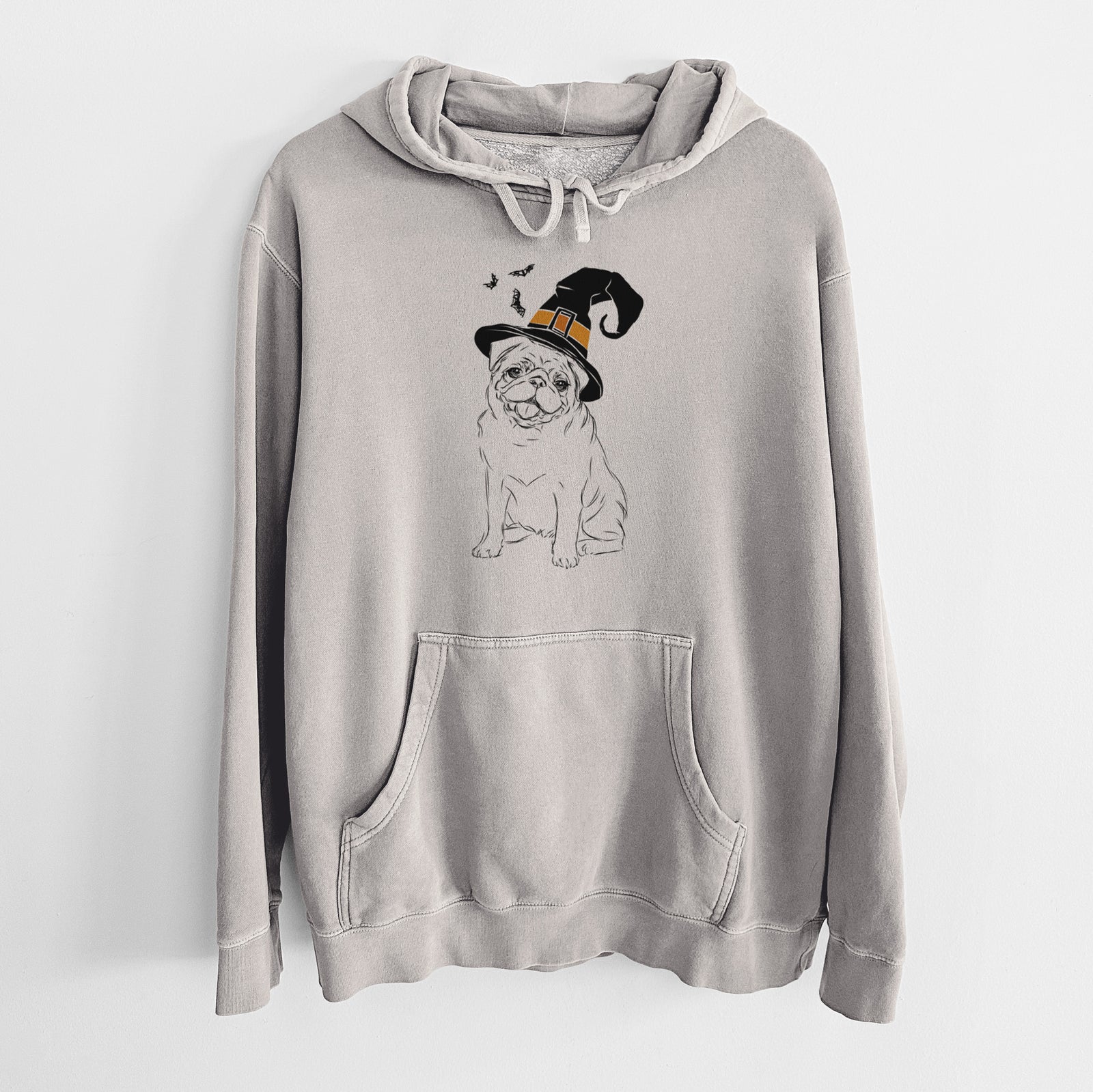 Hand-drawn sketch of Higgins the Pug wearing a witch hat on a Cement Unisex pigment dyed hoodie