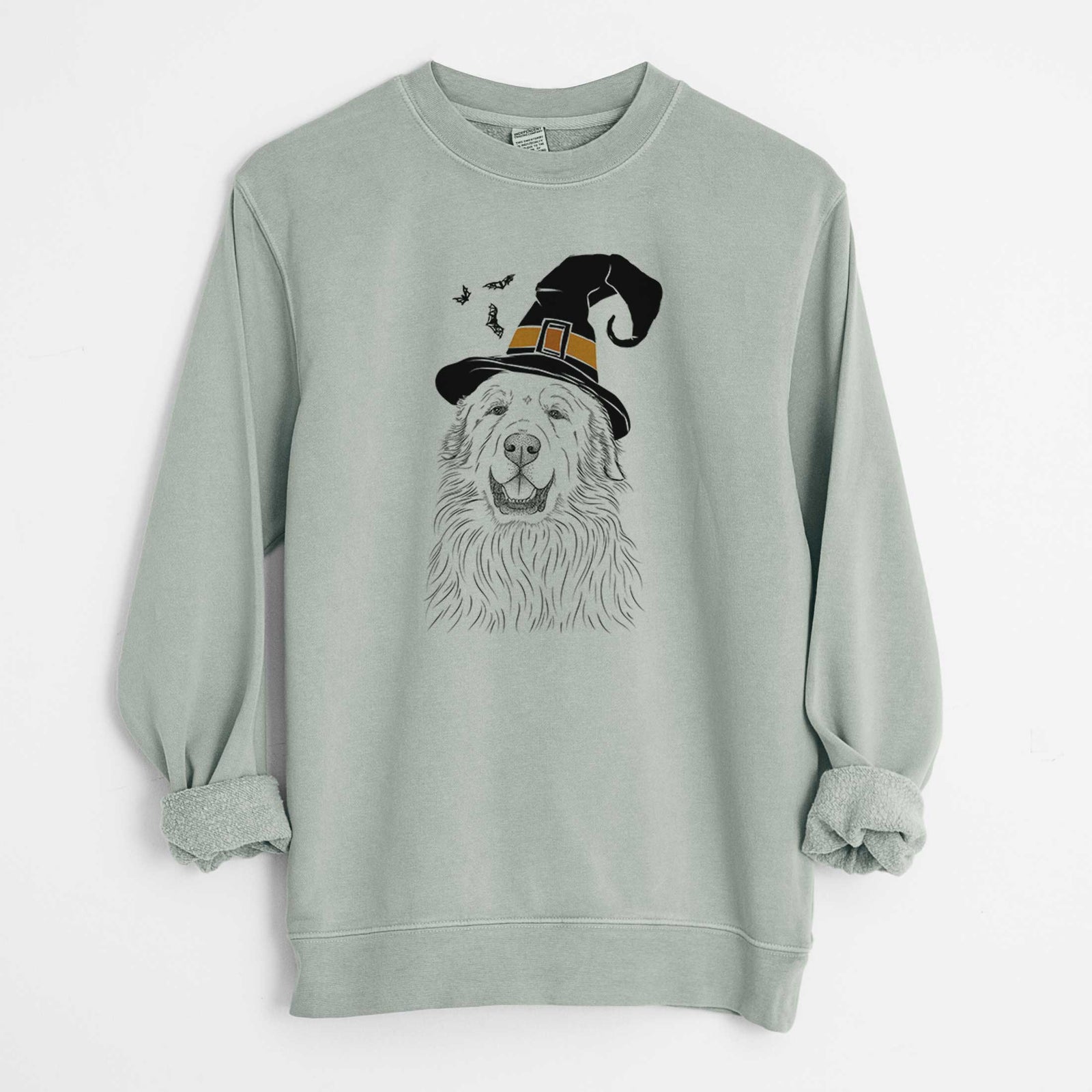 Hand-drawn sketch of Horton the Great Pyrenees wearing a witch hat on a Sage Unisex pigment dyed crew sweatshirt