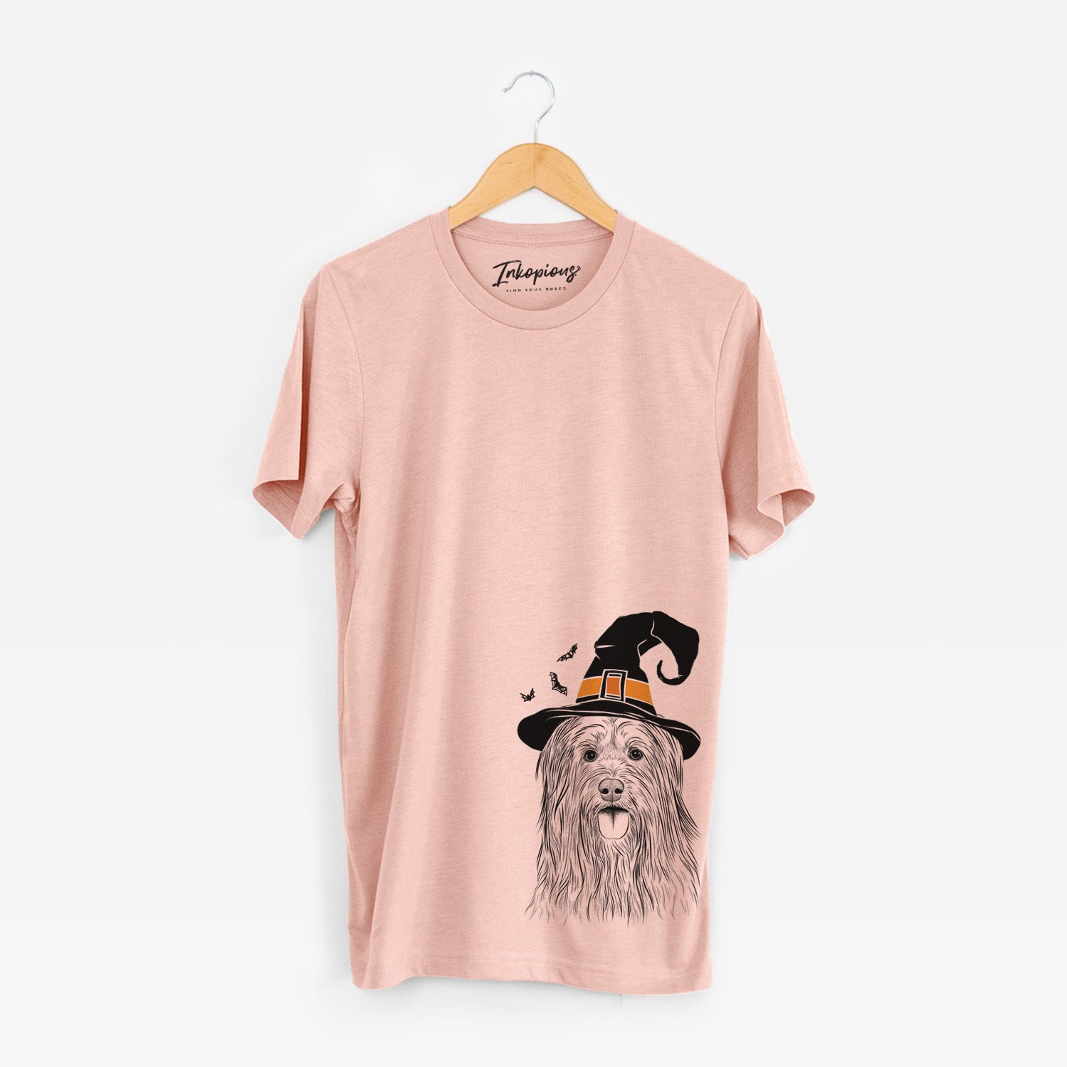 Hand-drawn sketch of Indy the Korean Sapsali wearing a witch hat on a Peach Unisex crewneck