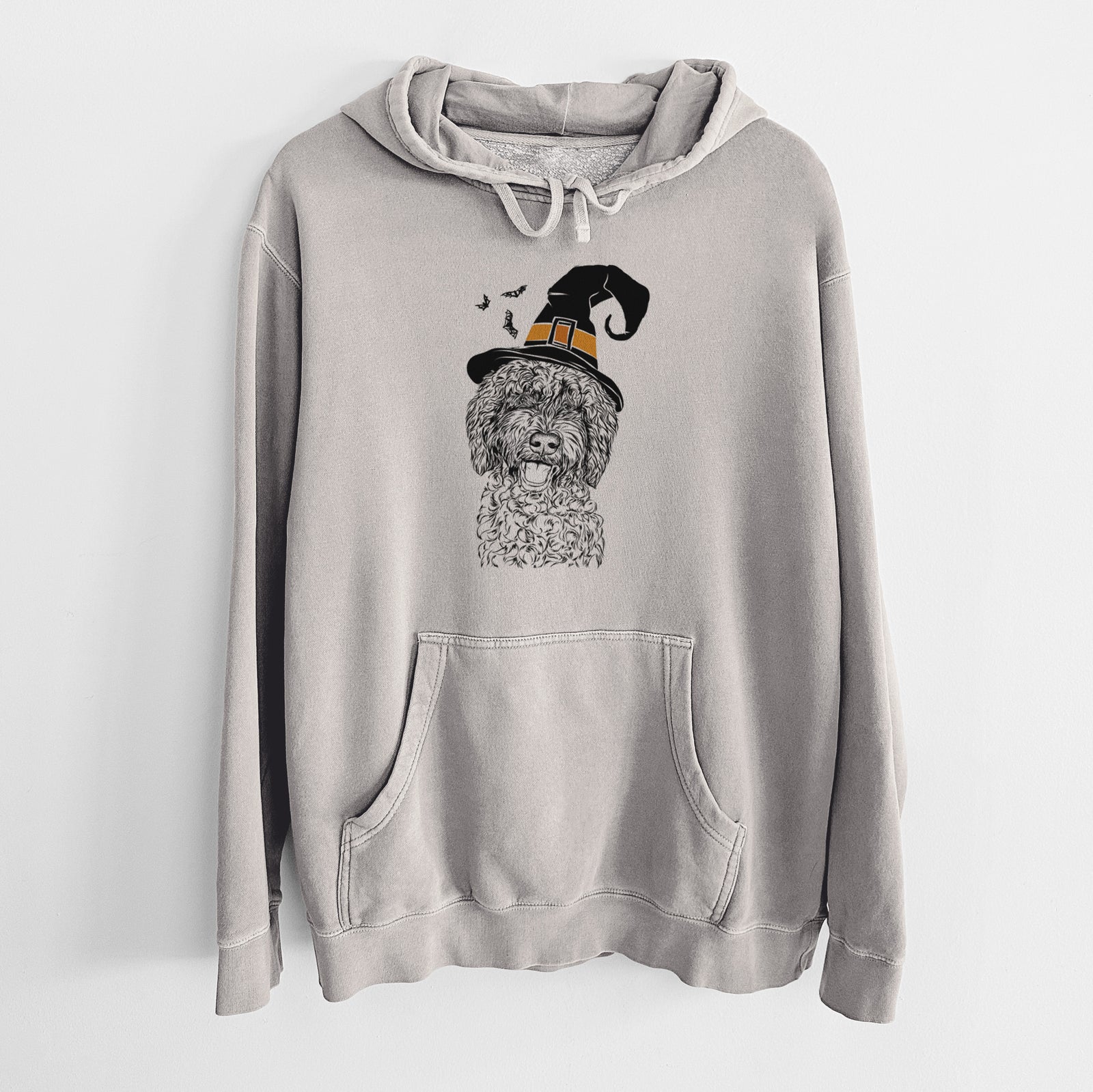 Hand-drawn sketch of Jack the Chocolate Labradoodle wearing a witch hat on a Cement Unisex pigment dyed hoodie