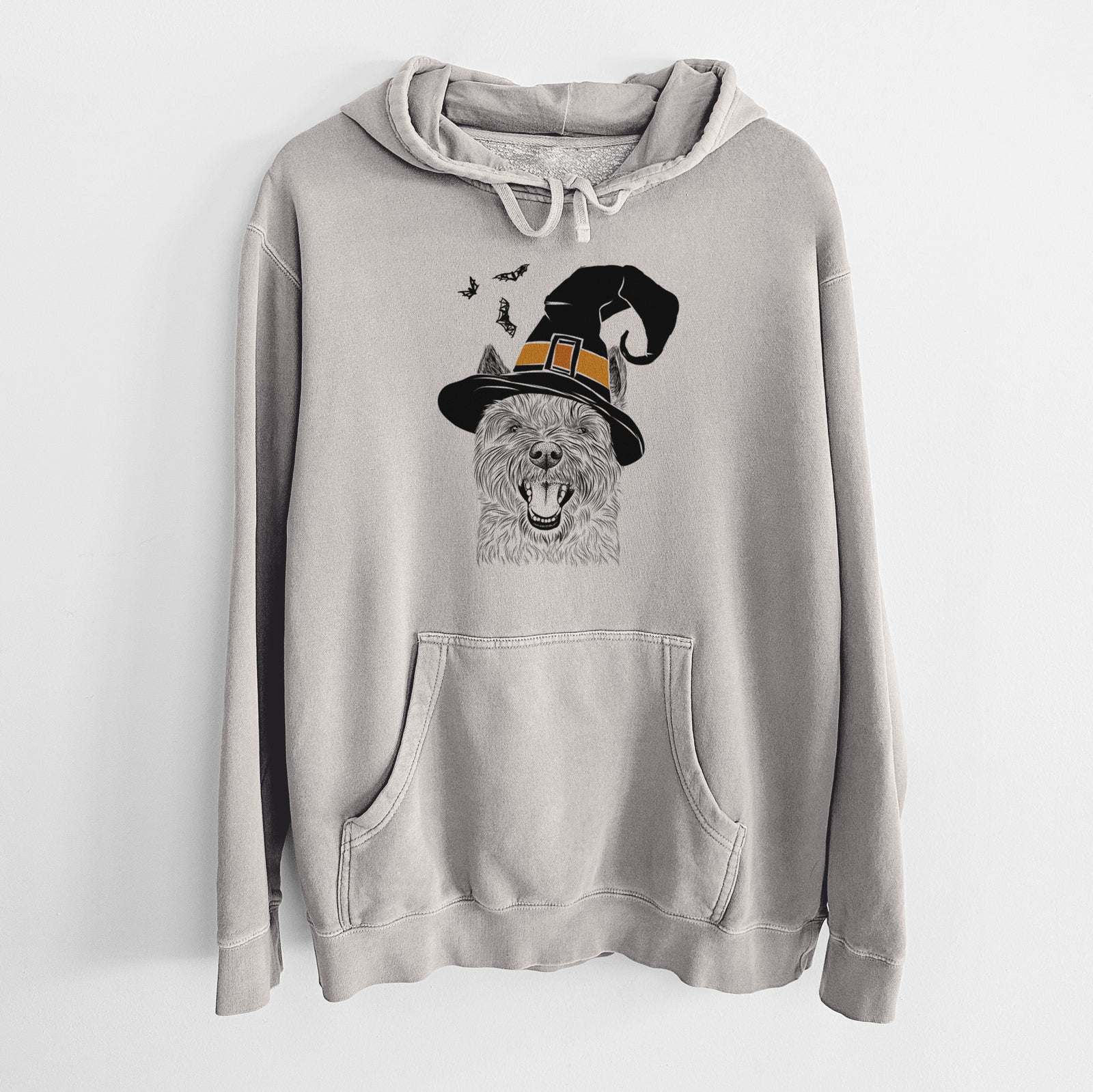 Hand-drawn sketch of Jeff the Cairn Terrier wearing a witch hat on a Cement Unisex pigment dyed hoodie